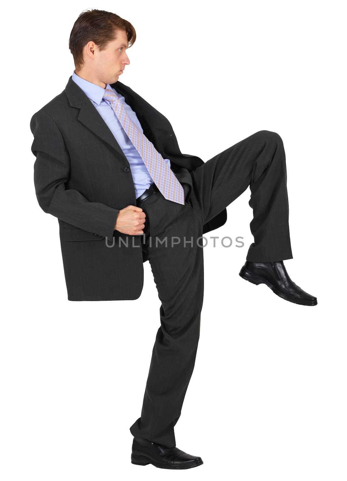 Businessman knee kick, isolated on a white background 