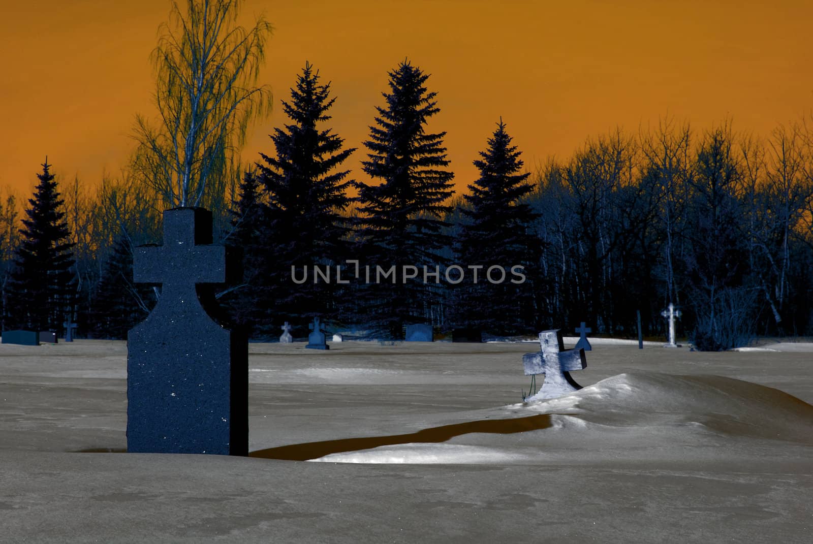 A graveyard at night with some light fog in the air