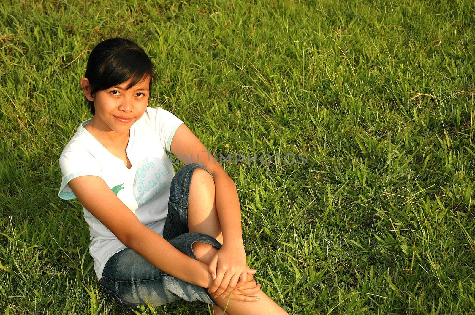 young asian girl get relax in the greenfield