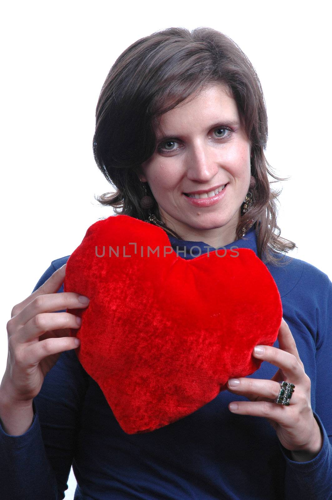 pretty young woman holding a Valentines heart

