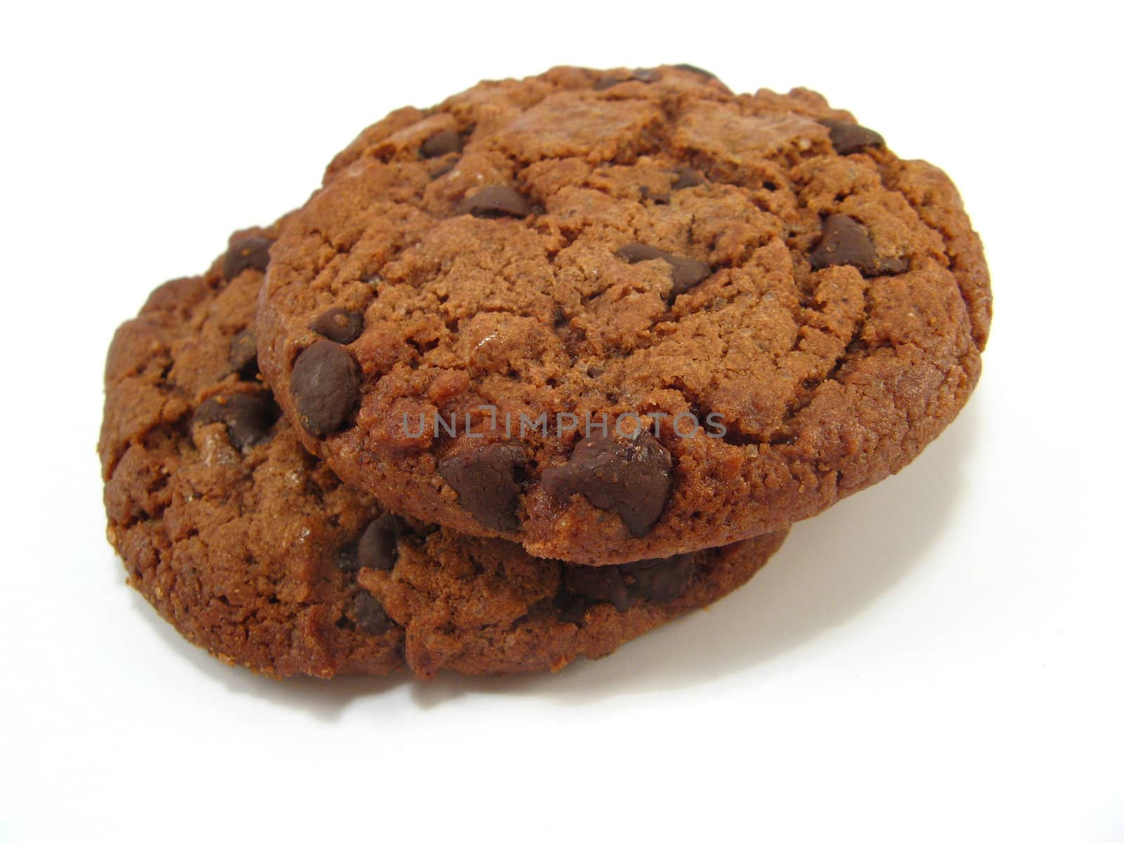 some chocolate cookies over a white background
