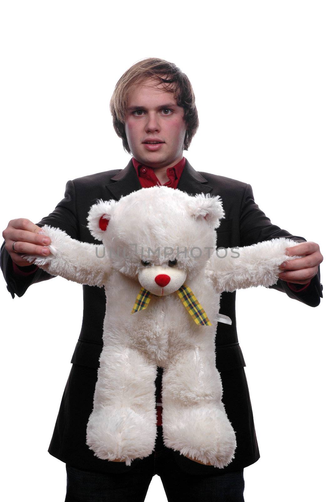 Handsome young man with teddy bear