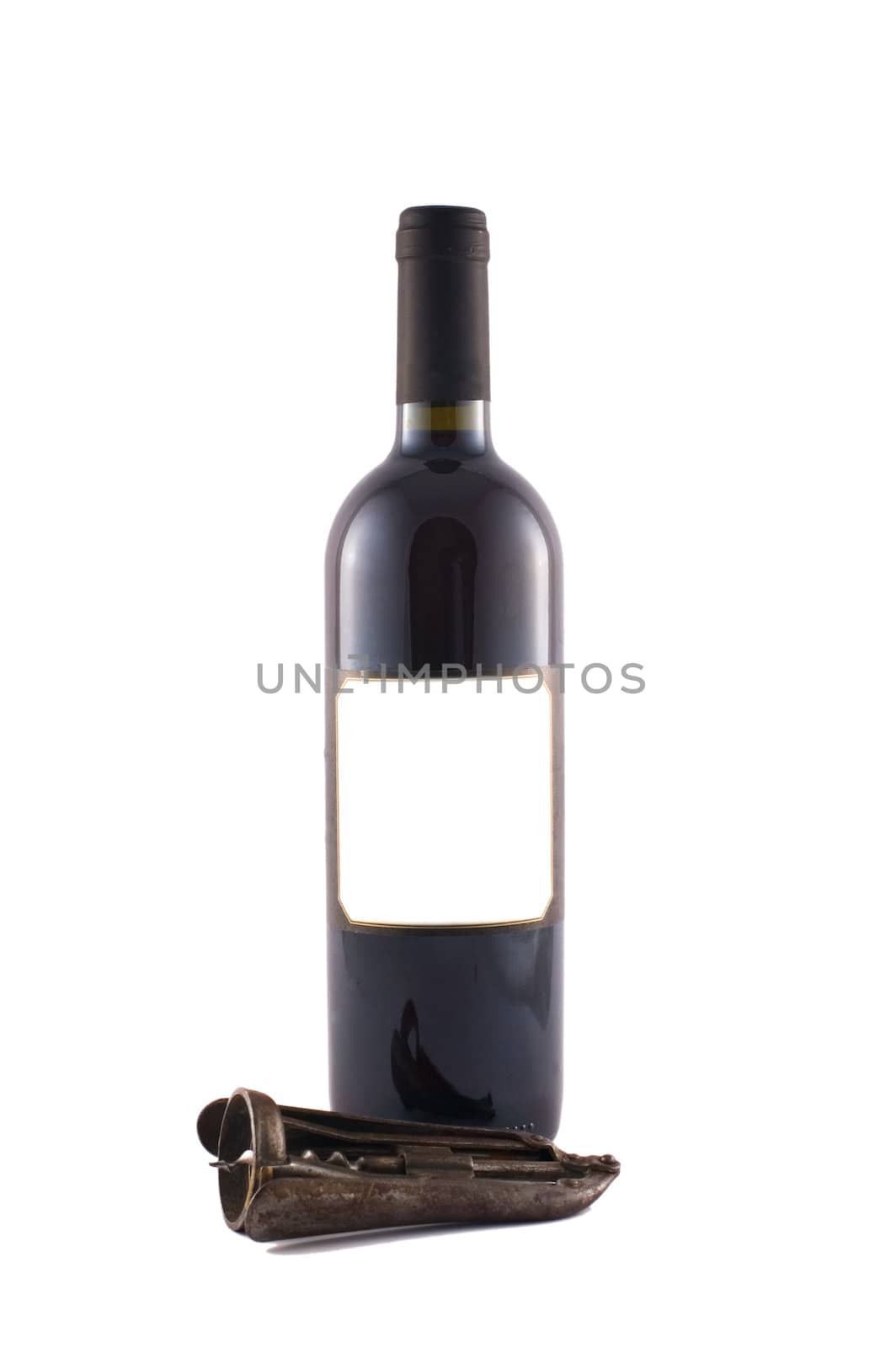 Wine bottle and corkscrew isolated on white