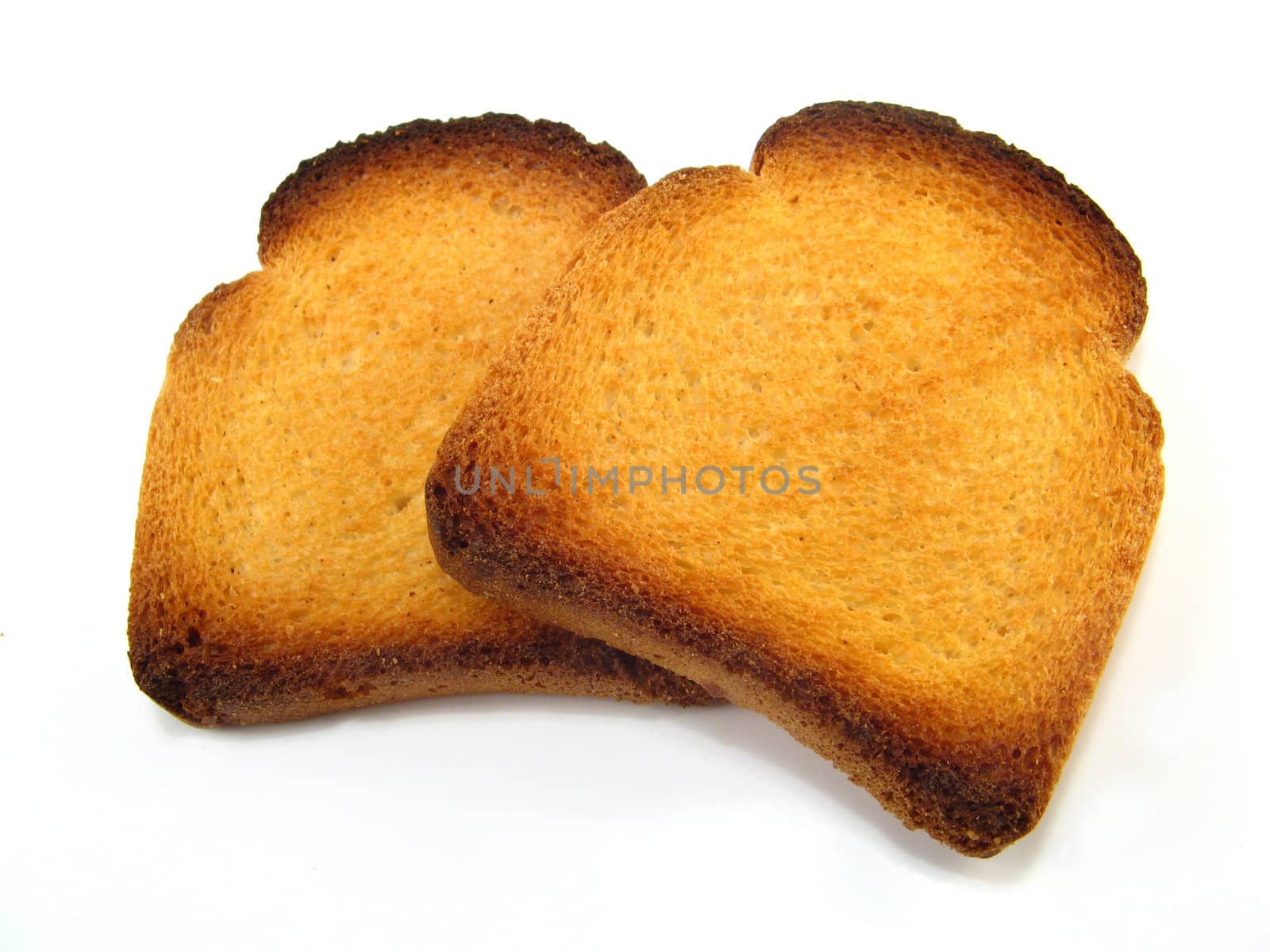 some slices of melba toast over a white background
