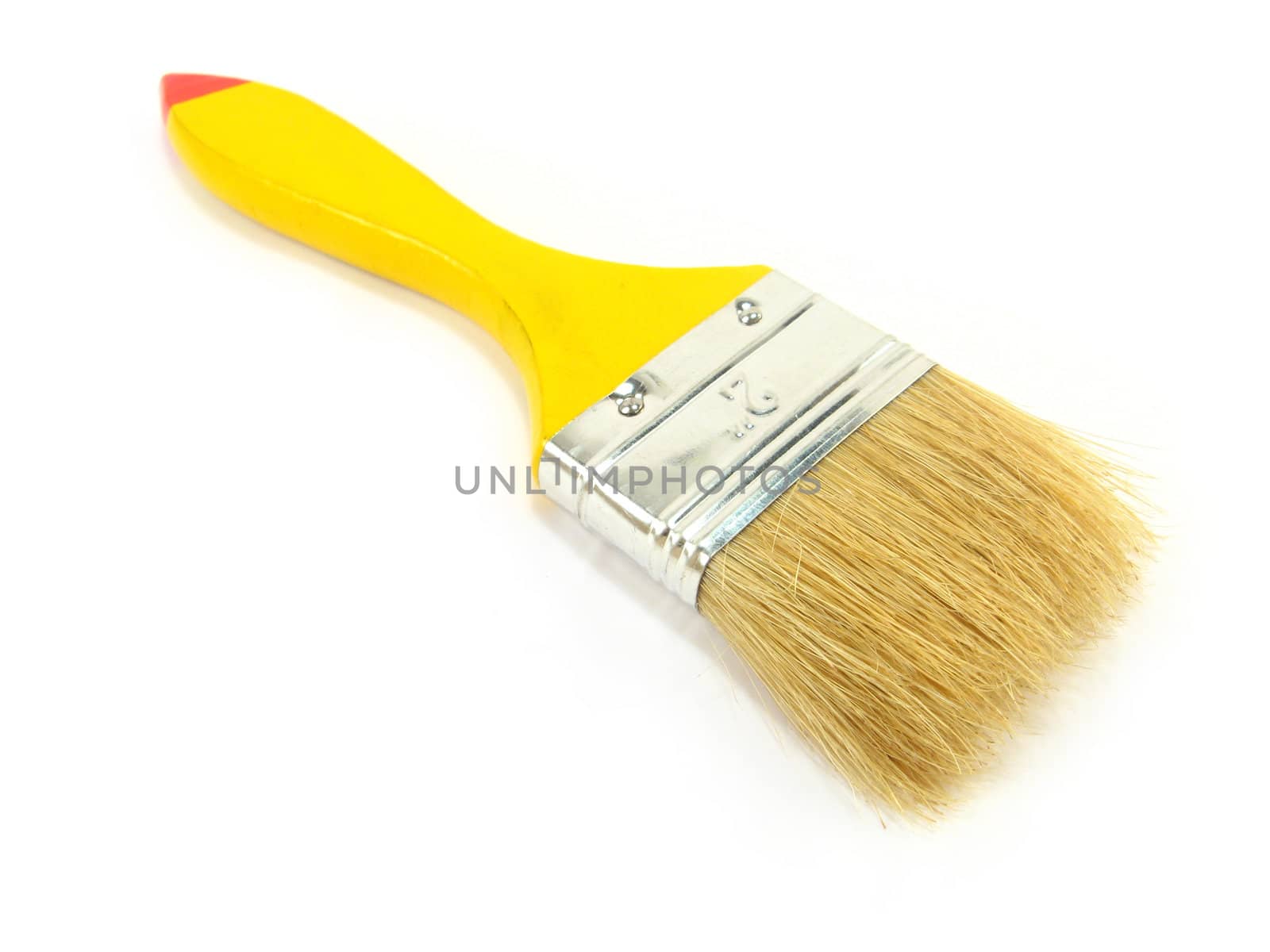 a yellow paintbrush over a white background