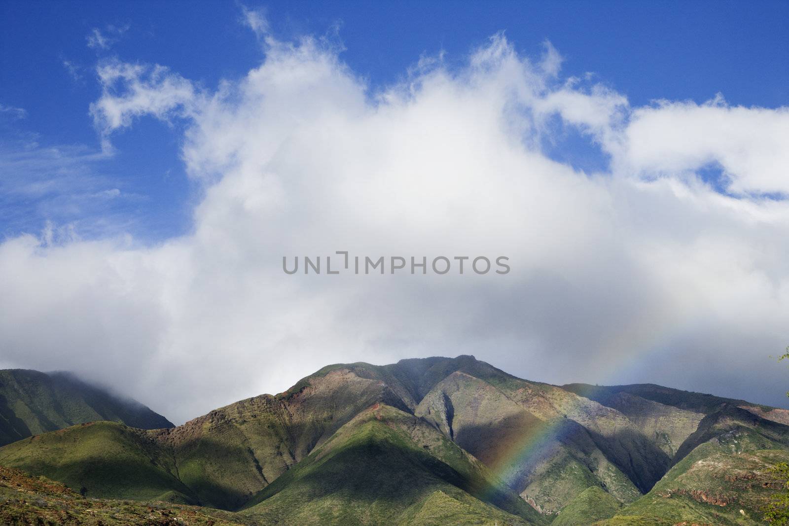 Maui mountains with rainbow. by iofoto