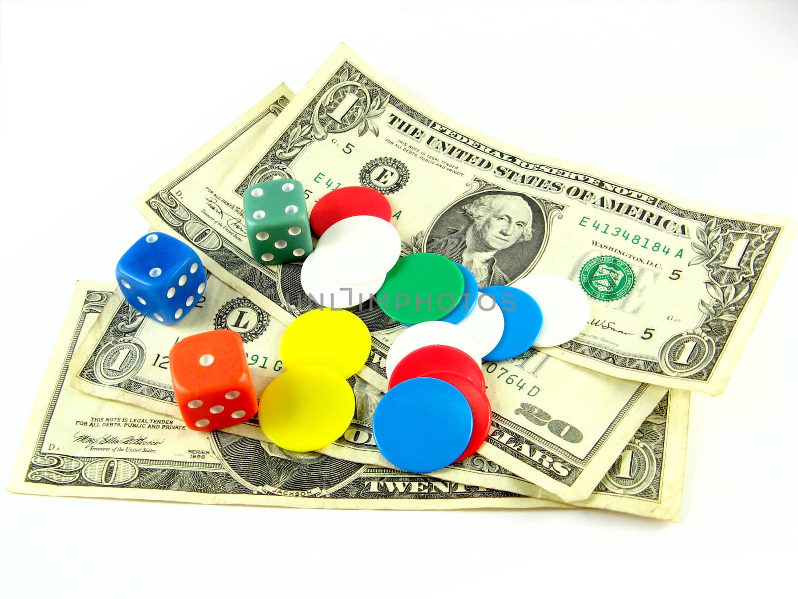 dices,tokens and dollars over a white background