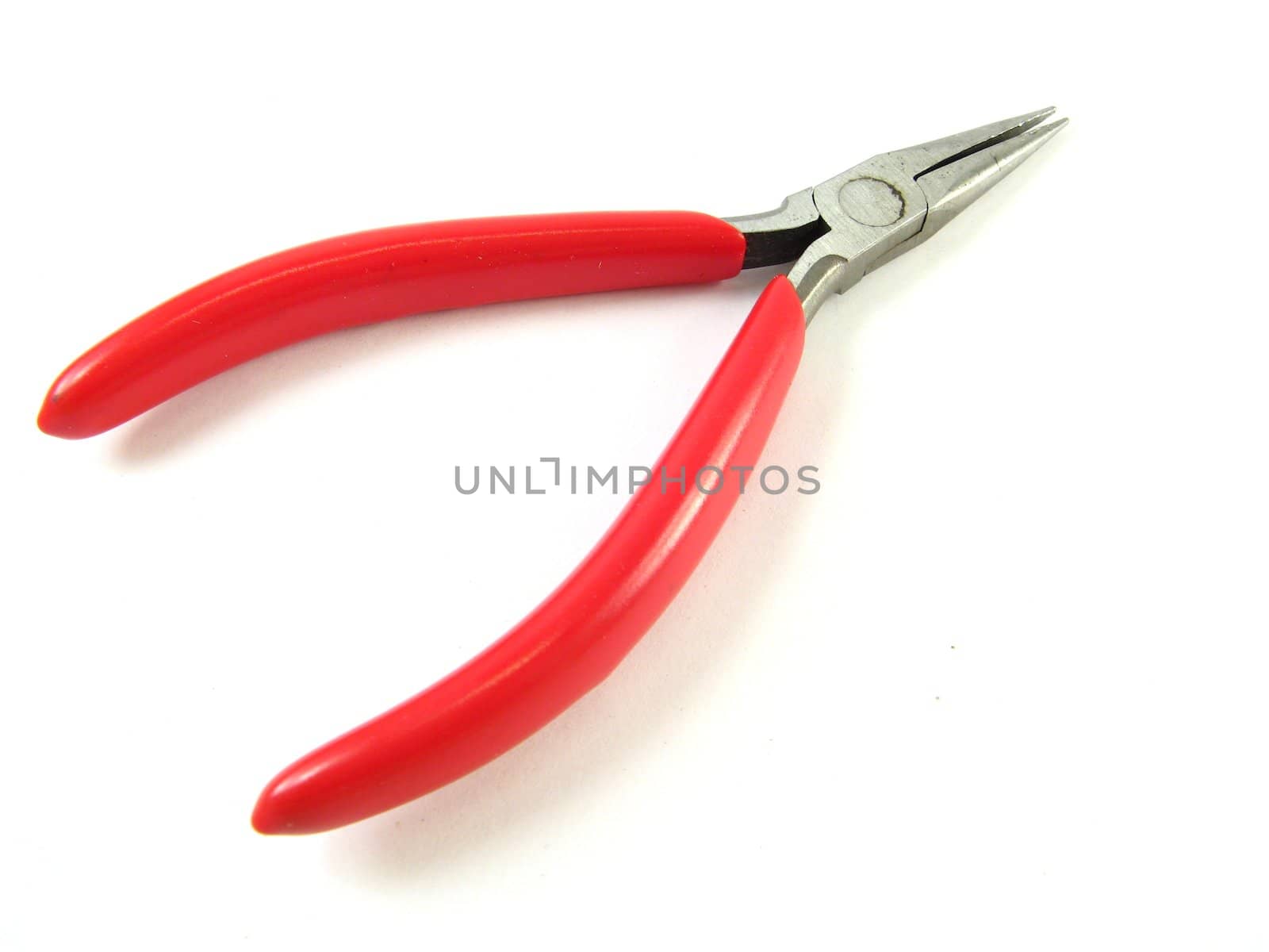 some red pliers over a white background