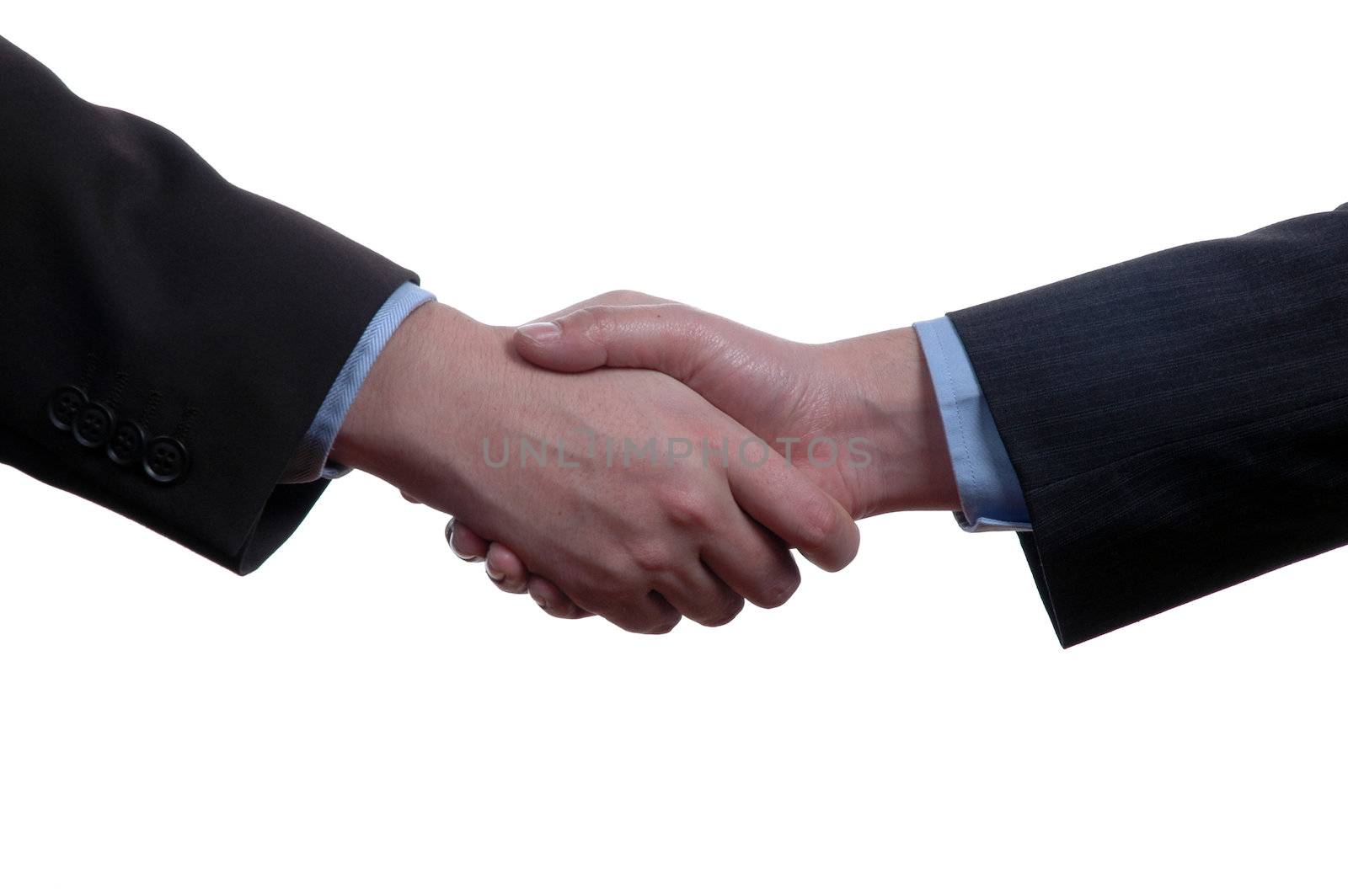 handshake of businesspeople over white background by raalves