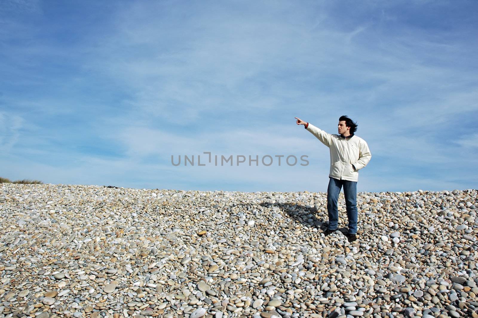 Young Man Gestures at the beach by raalves