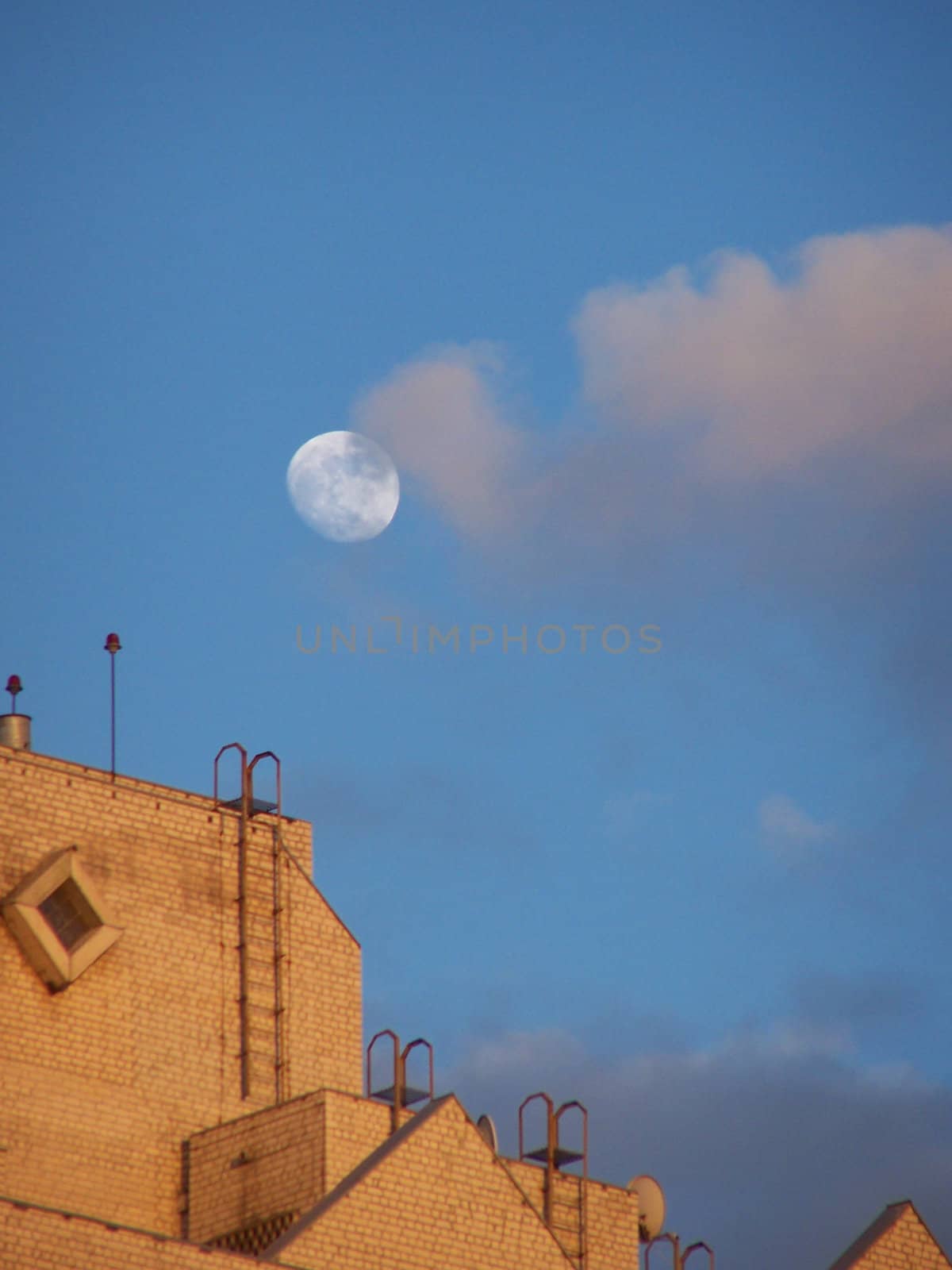 Moon, sky, clouds, and roof. by Lessadar