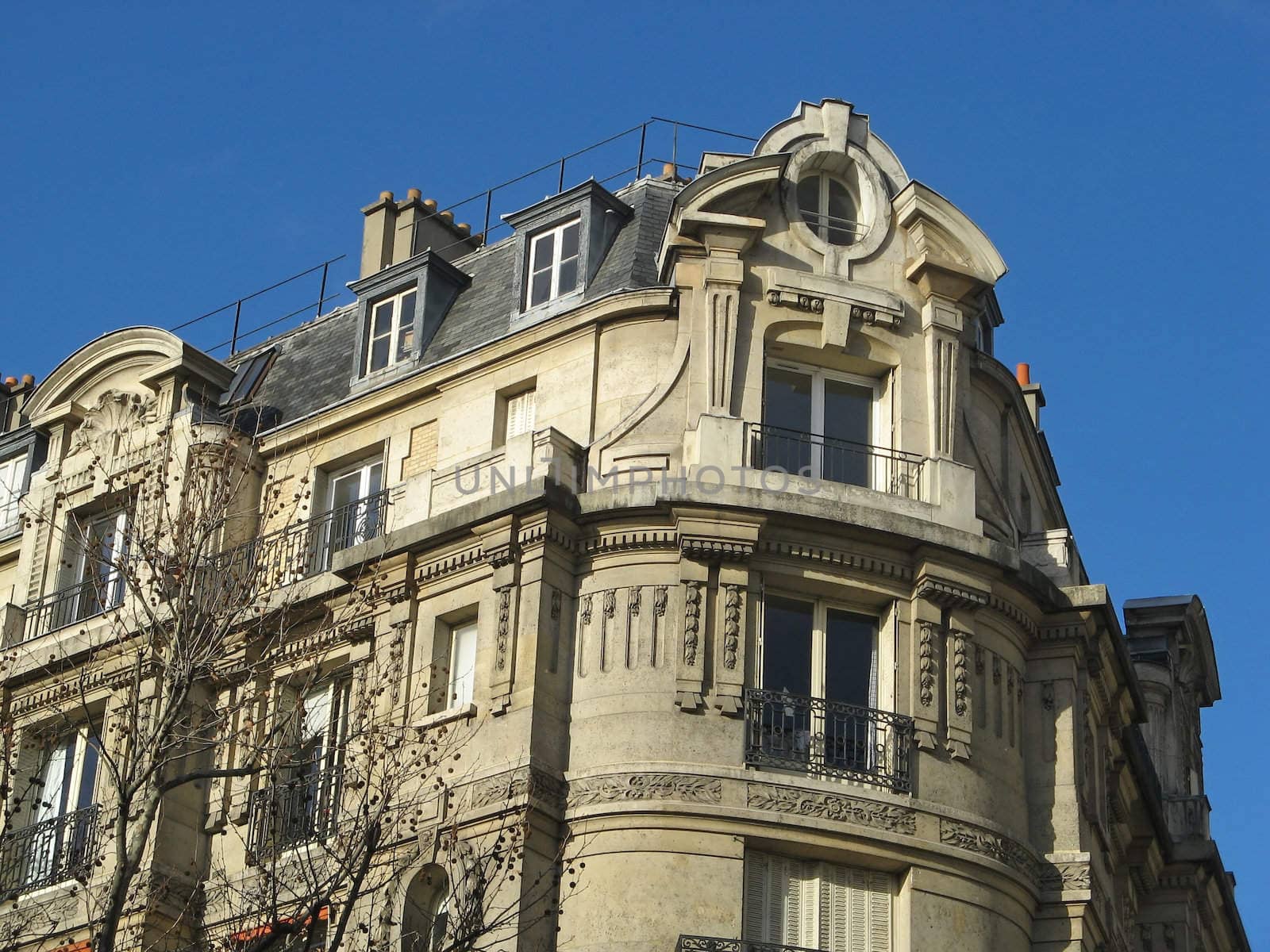 view of an ancient building on the grand parisian boulevards