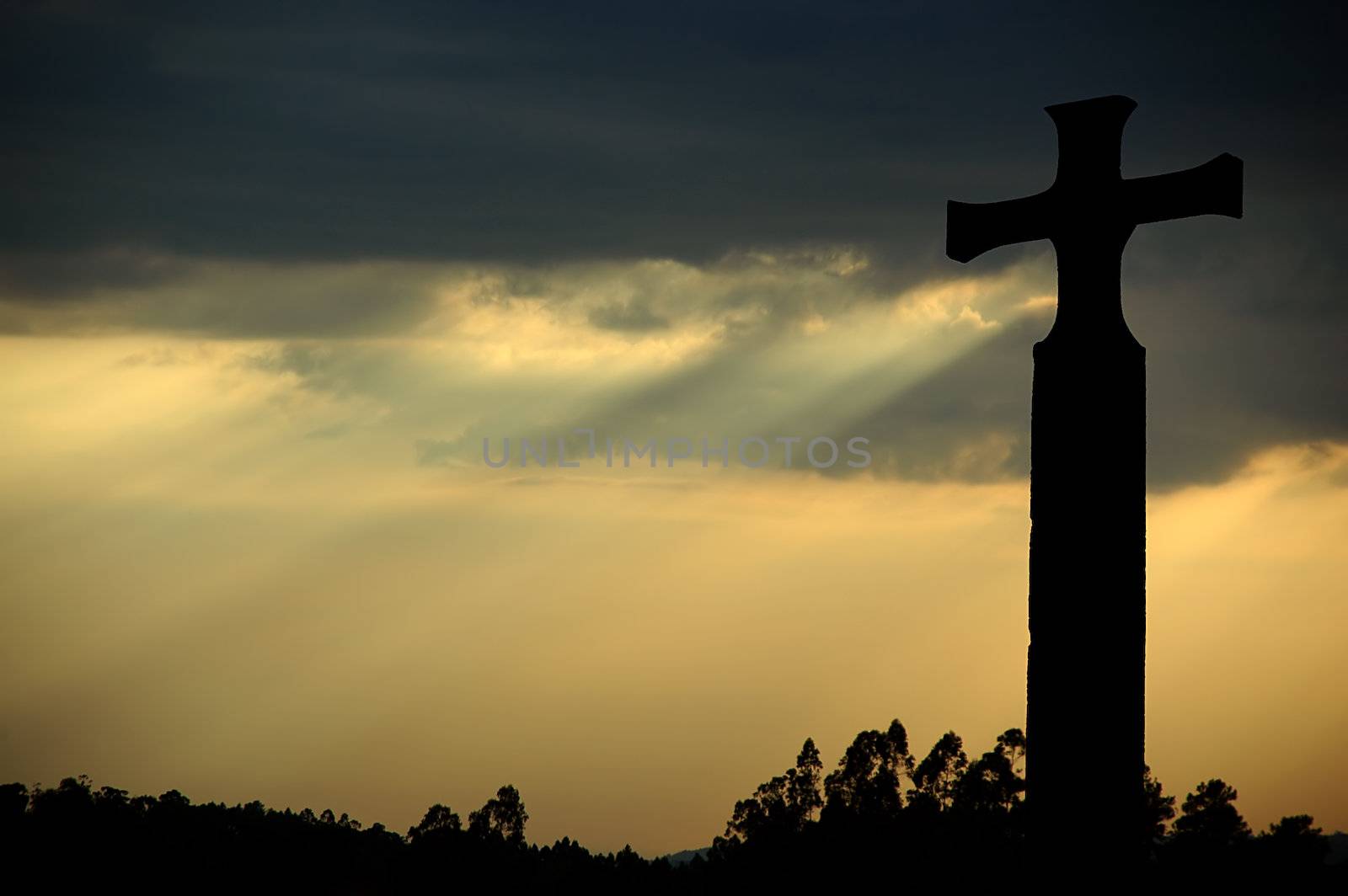 cross silhouette in heaven sky