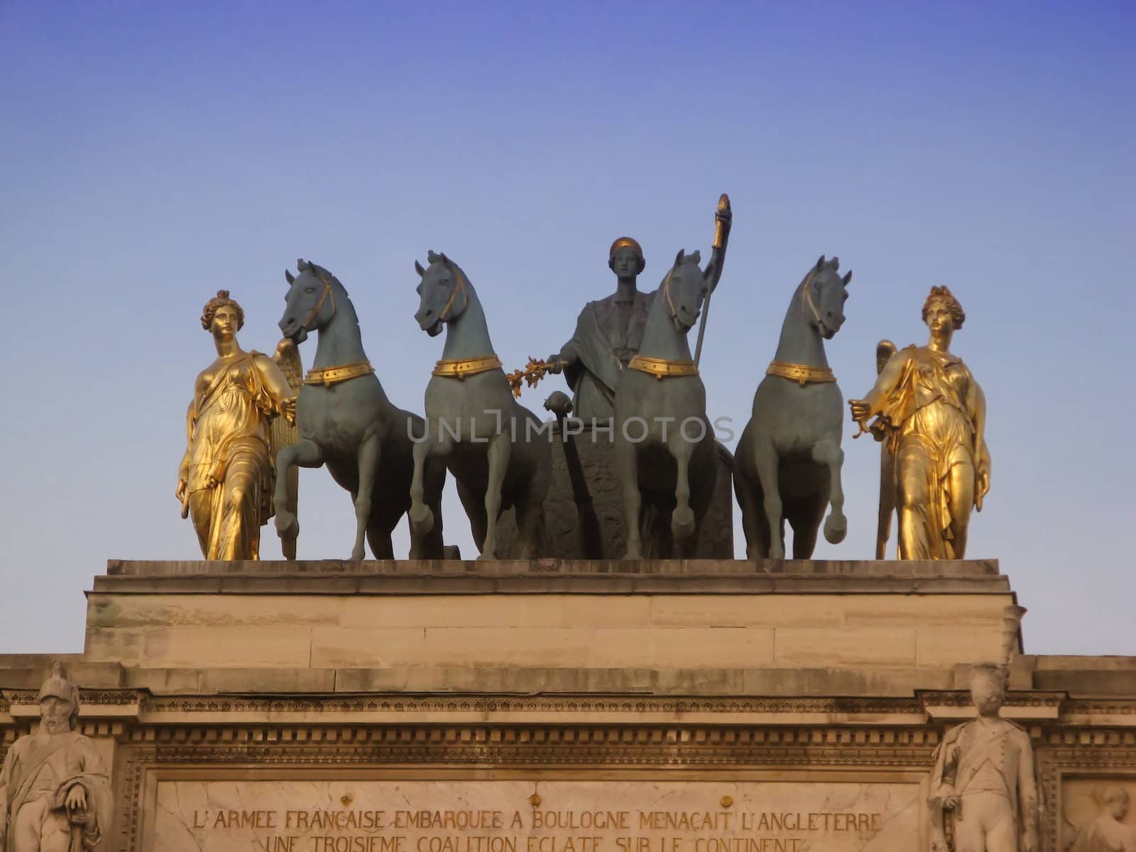Statues group on the top of the triump arch of the Louvre Carousel in Paris