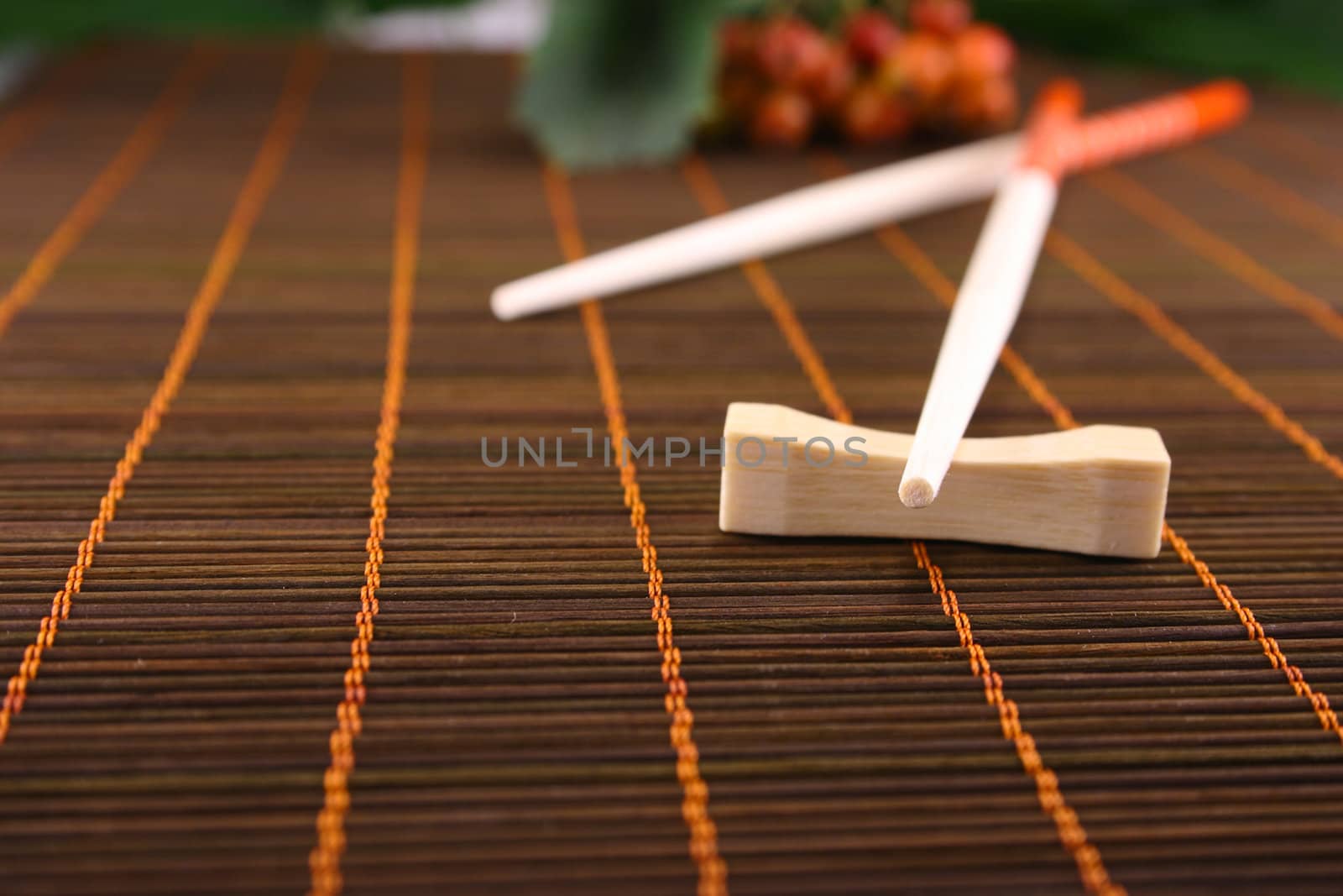 Chopsticks on a bamboo napkin by Incarnatus