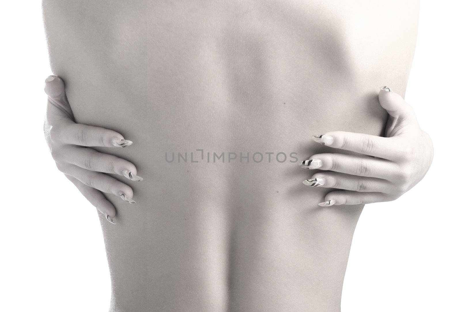 Naked female back and fingers with bright manicure isolated on white              
