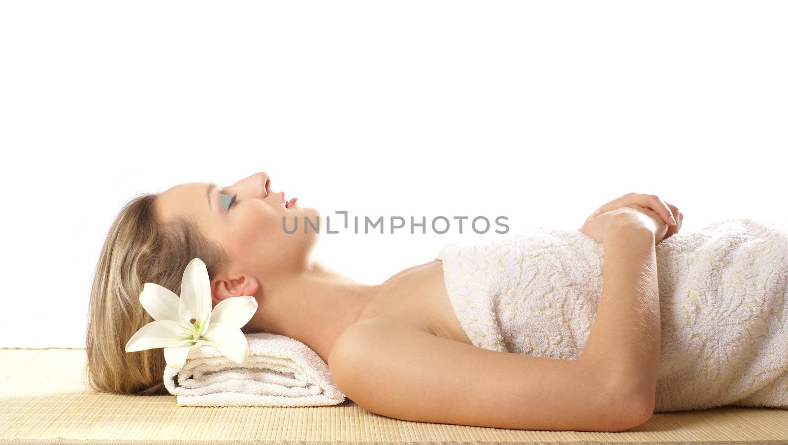 Attractive woman getting spa treatment by shmeljov