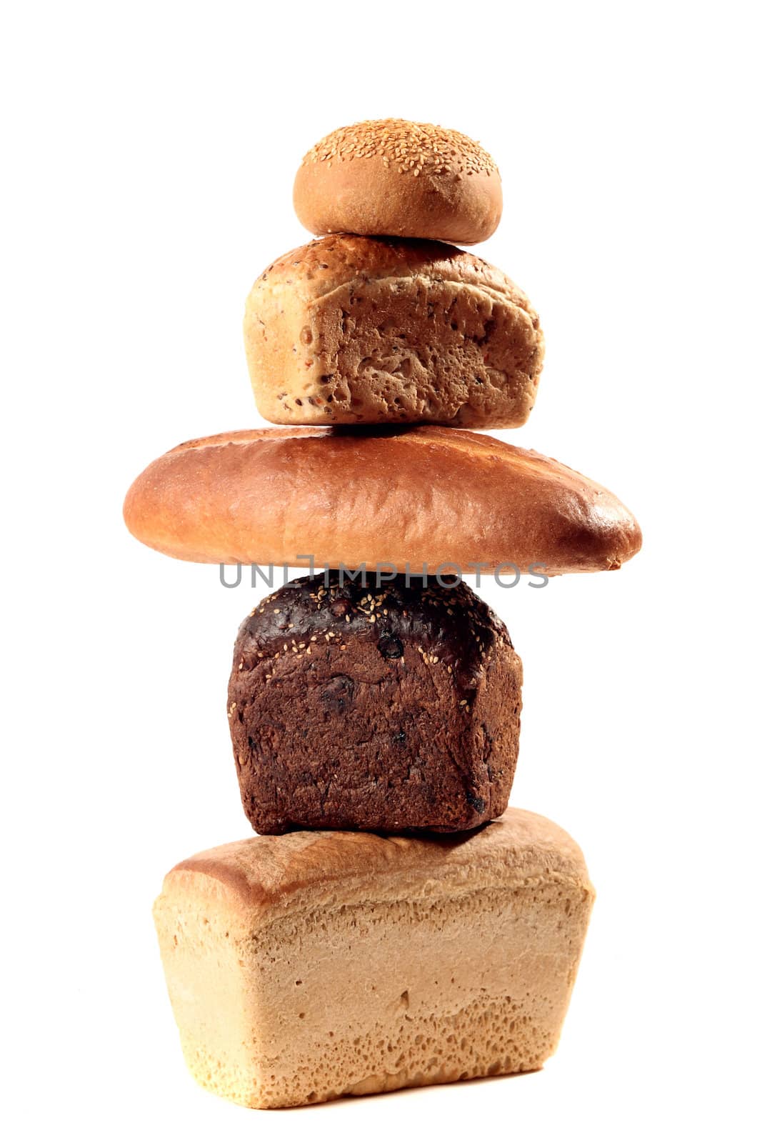 A lot of different bread on a white background
