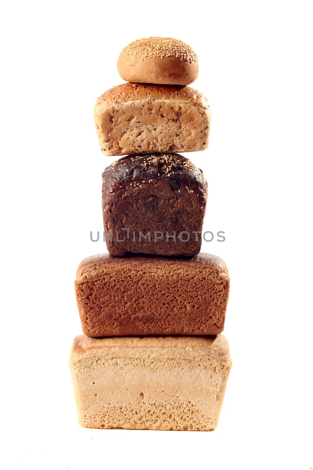 A lot of different bread on a white background
