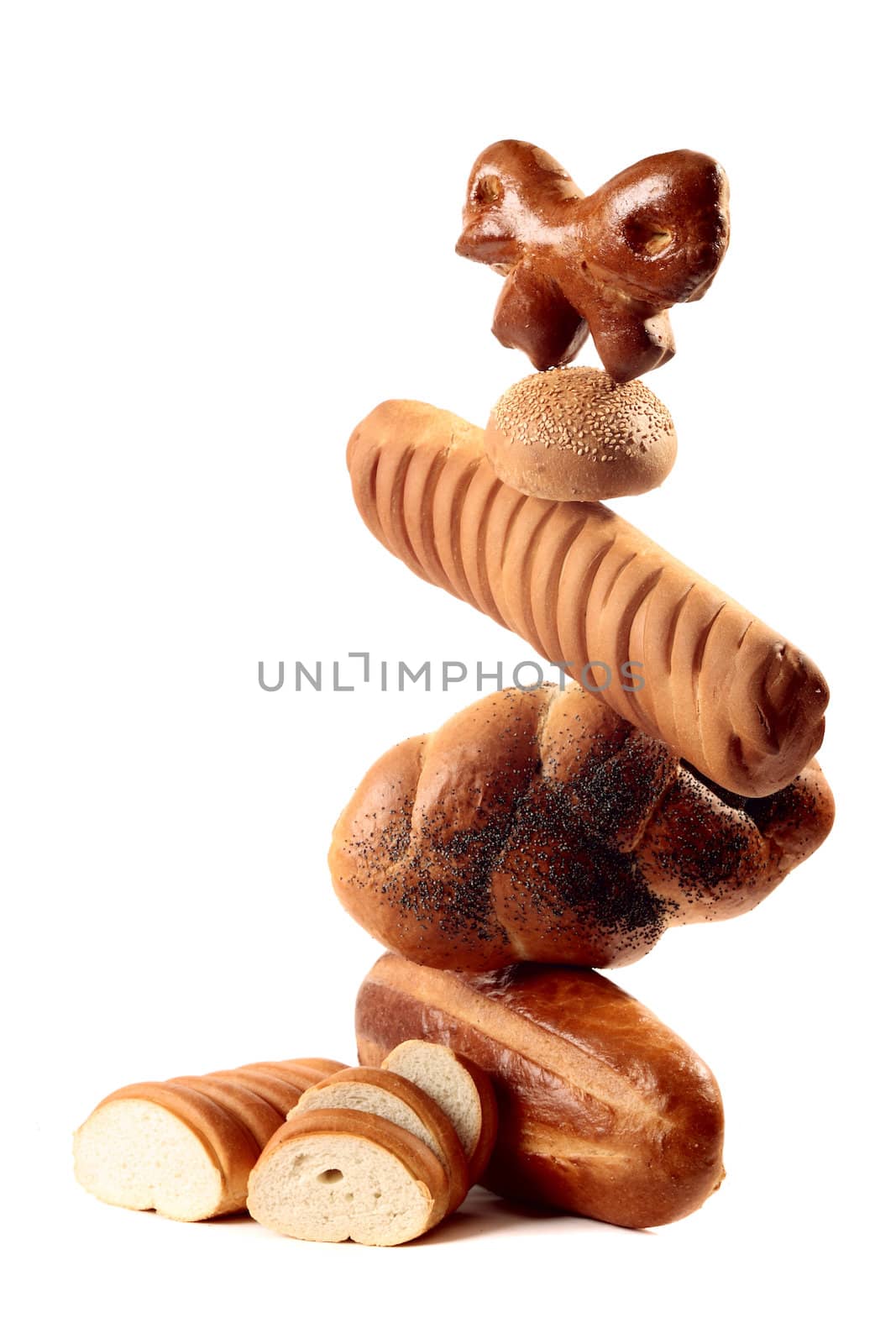 A lot of different bread on a white background
