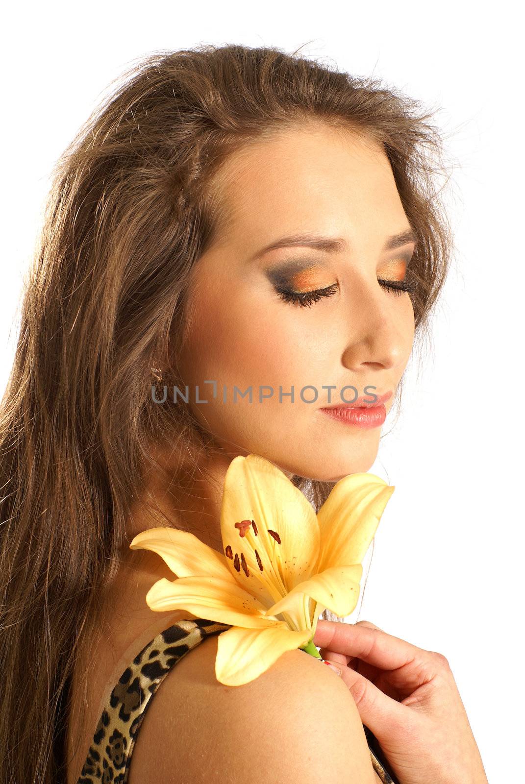 Young lovely woman with lily flower isolated on white              