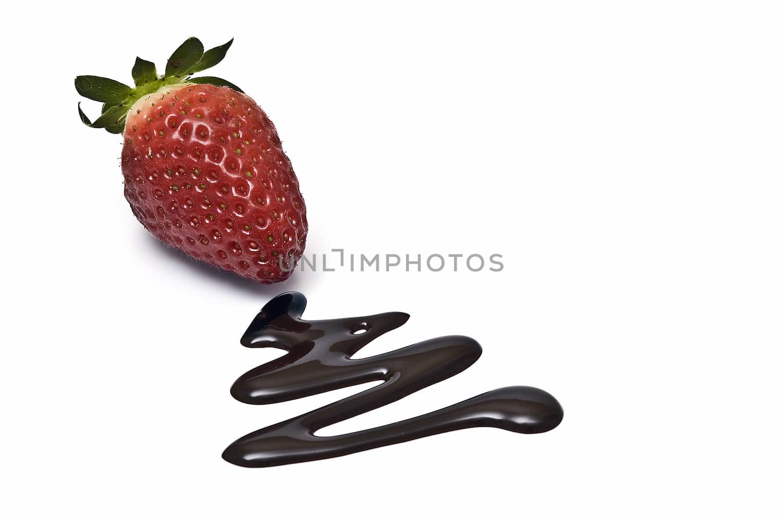 Strawberries with cocolate isolated on white background.