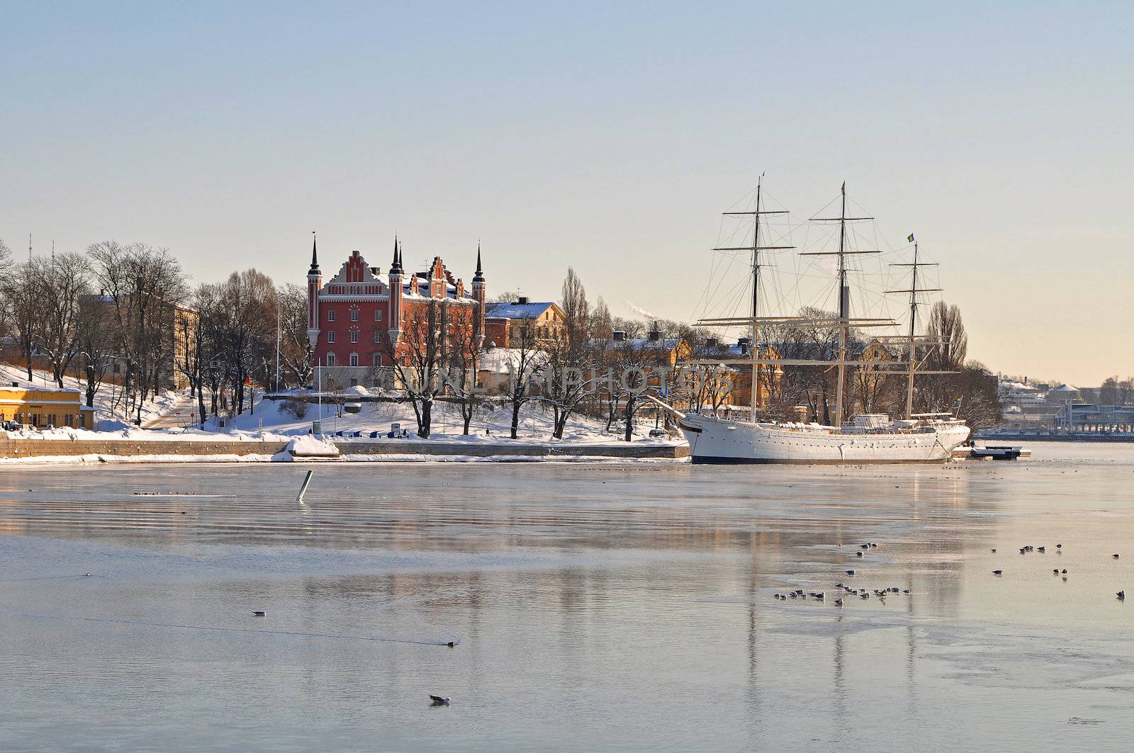 View over the icy water between skeppsbron and  skeppsholmen in Stockholm.