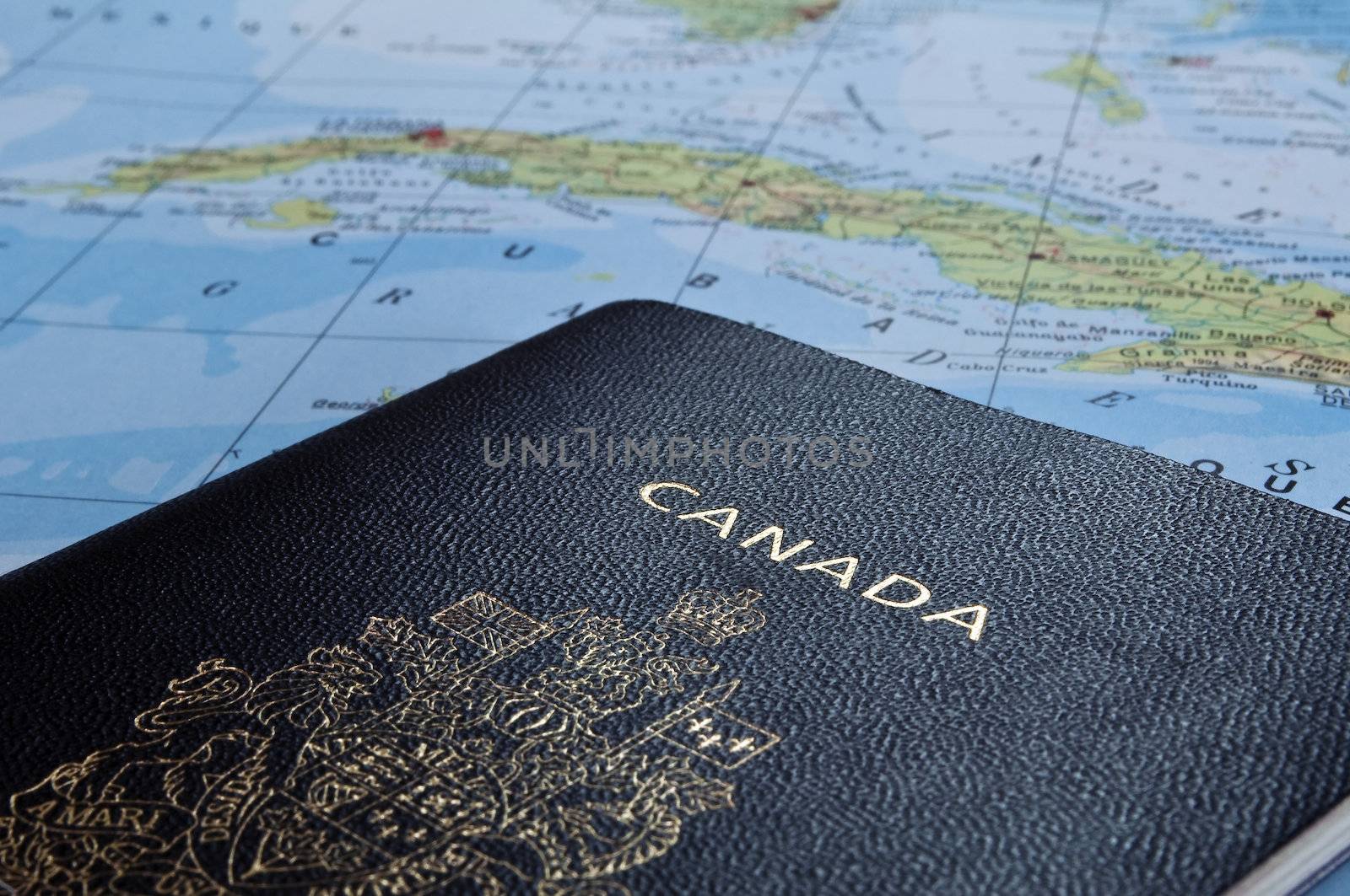 Photo of a Canadian passport on map of Cuba.