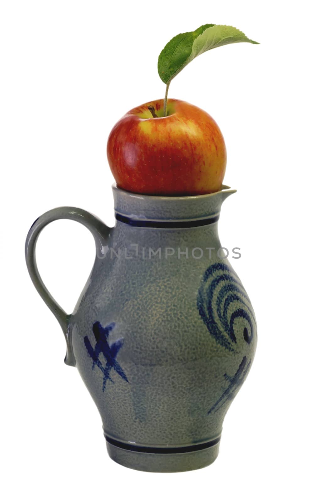 Jug of apple wine with an apple on white background