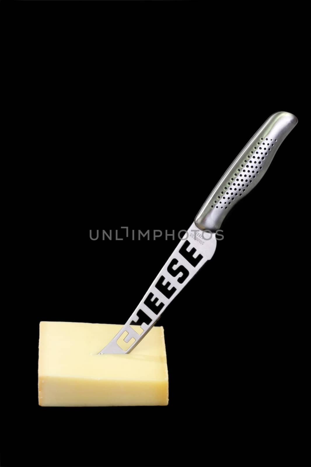 Piece of cheese with knife - isolated on white background