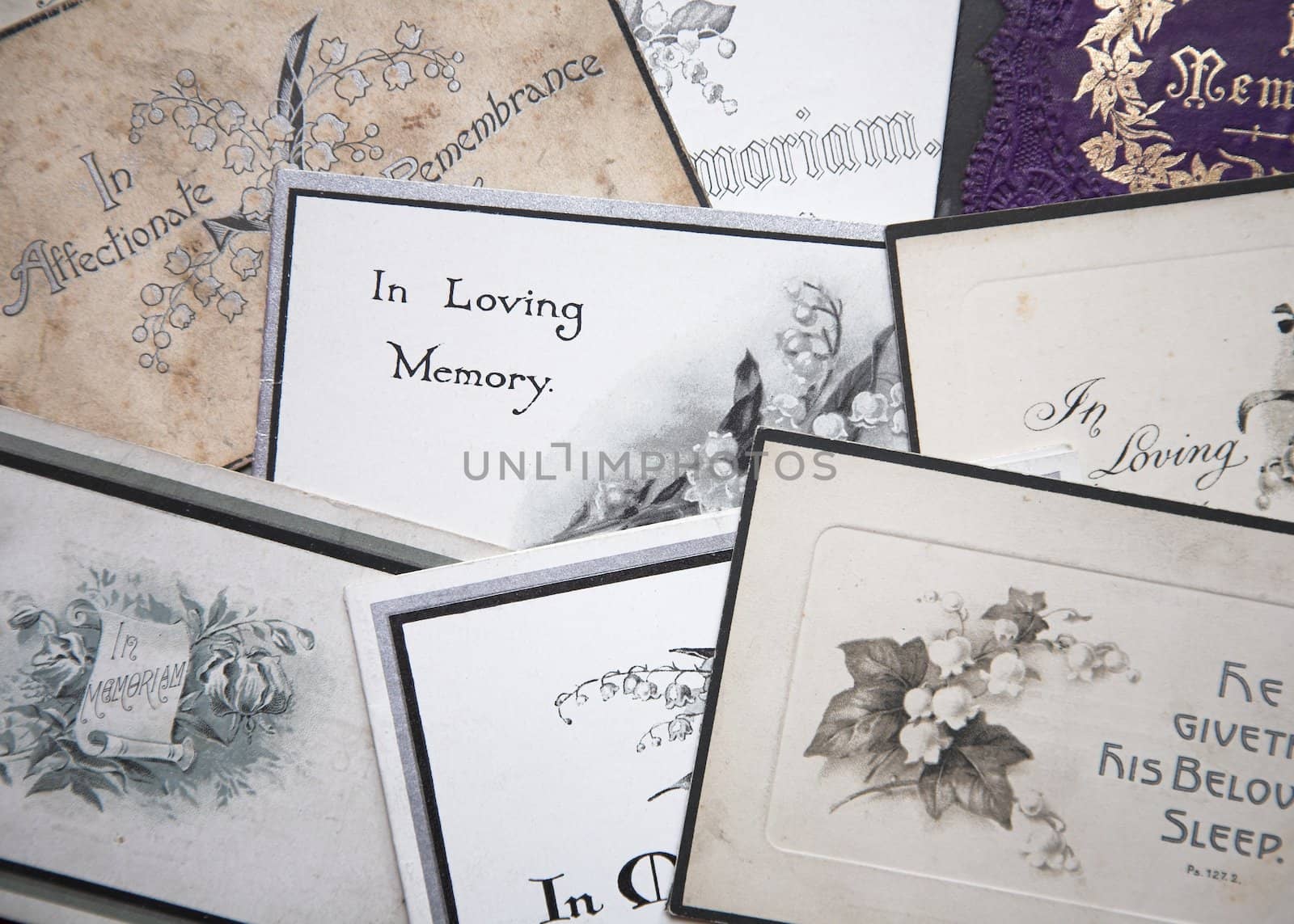 A selection of old In Memoriam cards.
