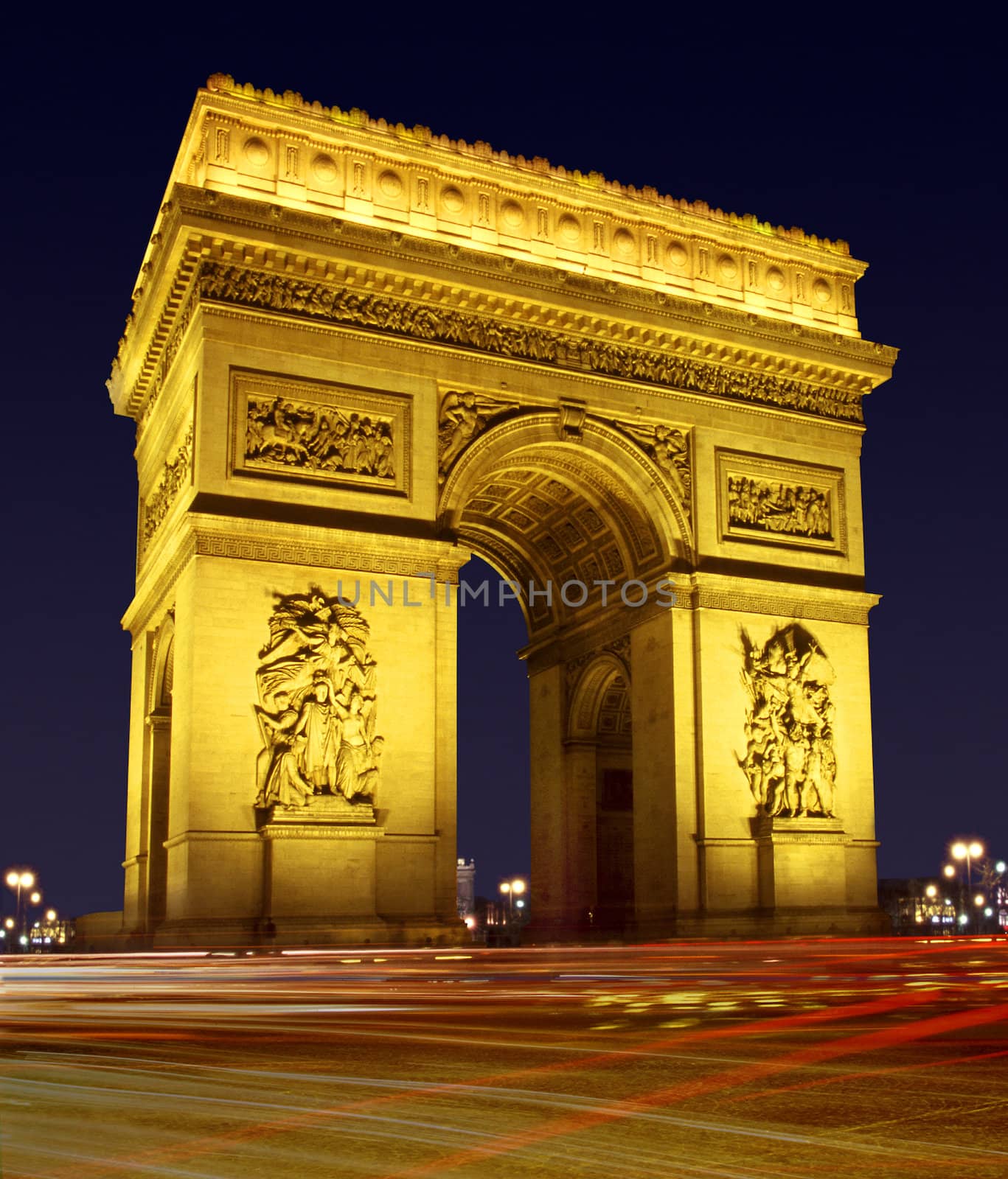 Arc de Triomphe France Europe Arc de Triomphe at Place Charles de Gaulle illuminated at night in Paris Headlights of traffic