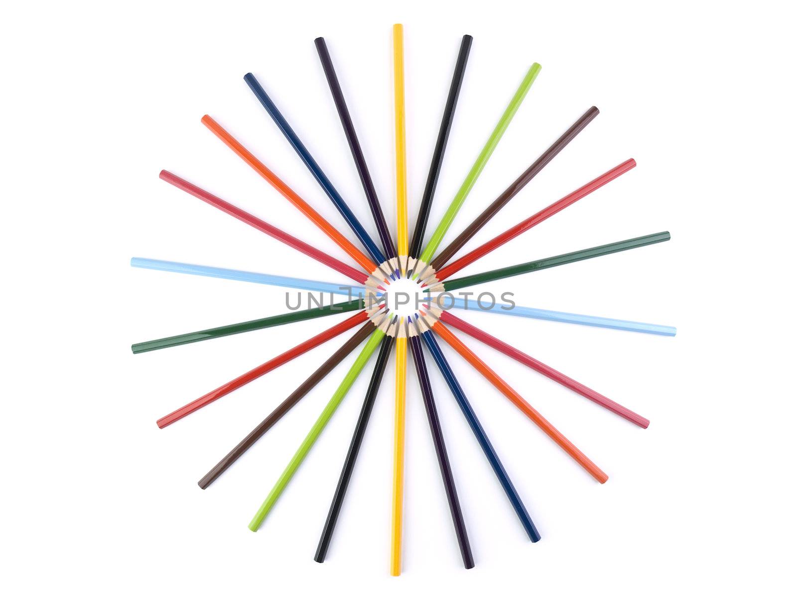 A circle formed by several colored pencils. Isolated on white.