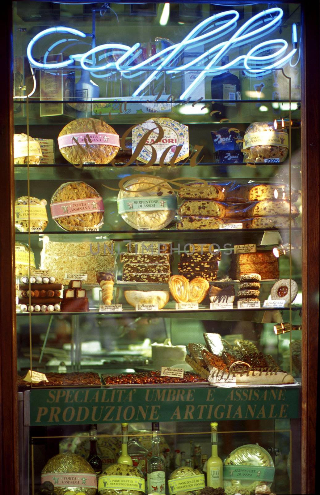 Café front Sienna Italy displaying baked goods.