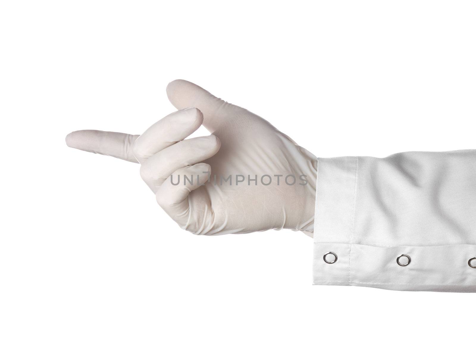 A doctor's hand is pointing to the left.