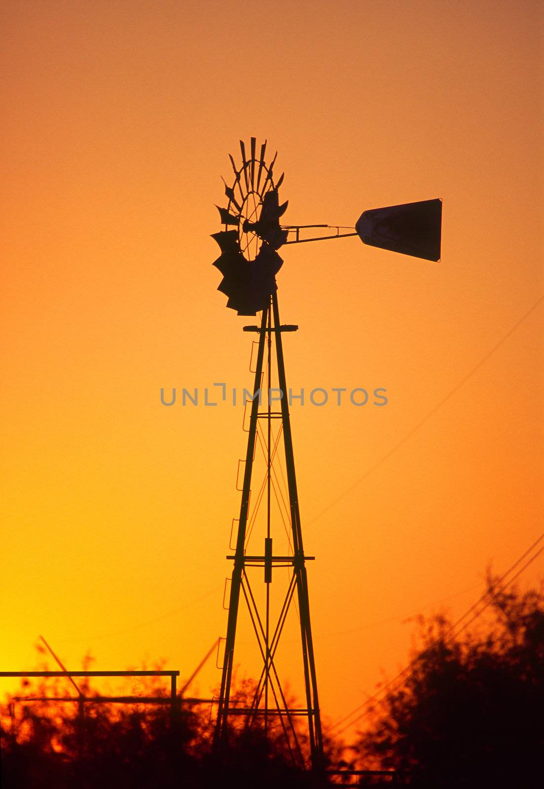 windmill at sunset near Palo Duro Canyon State Park Texas by hotflash2001