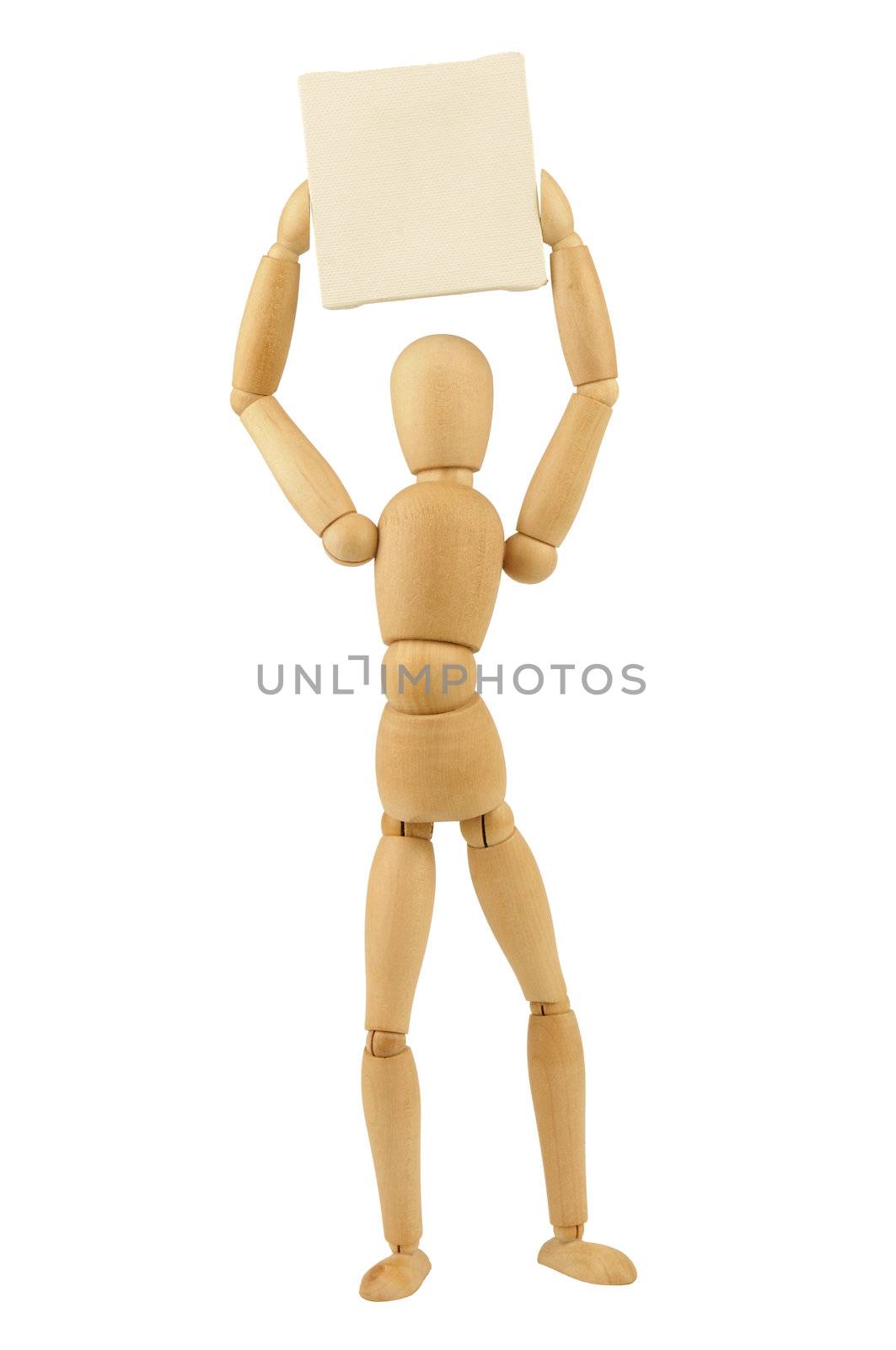  A wooden figurine holding a white  canvas