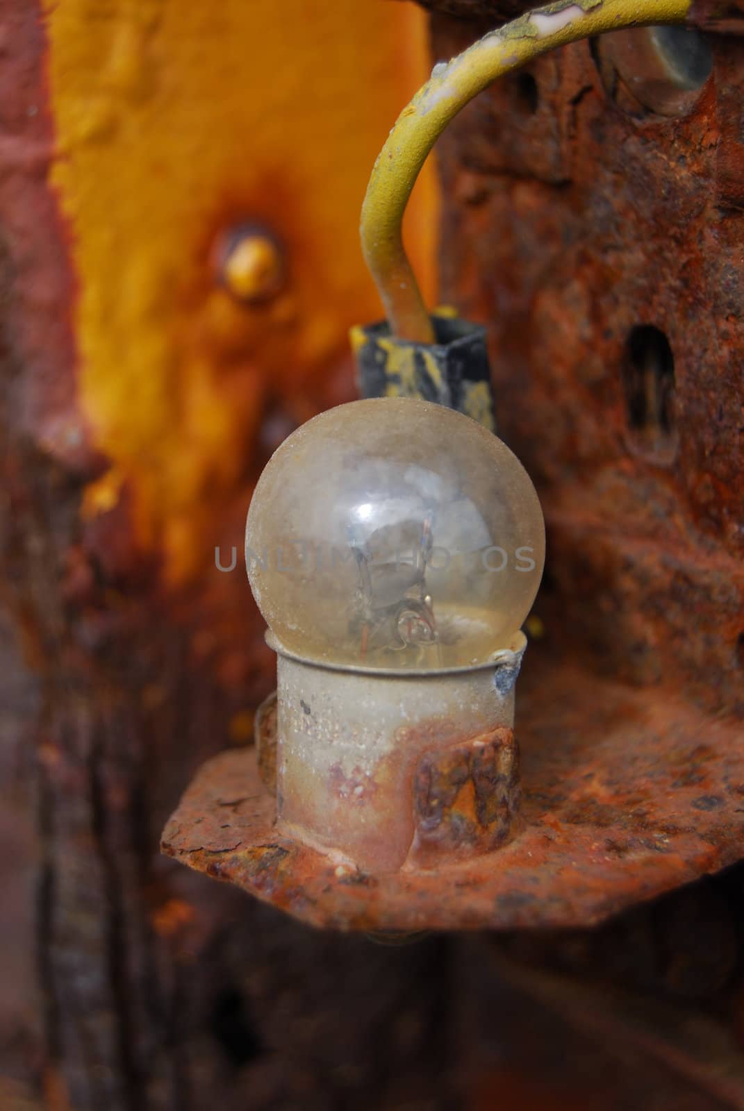 not working old blind light bulb on a rusty background