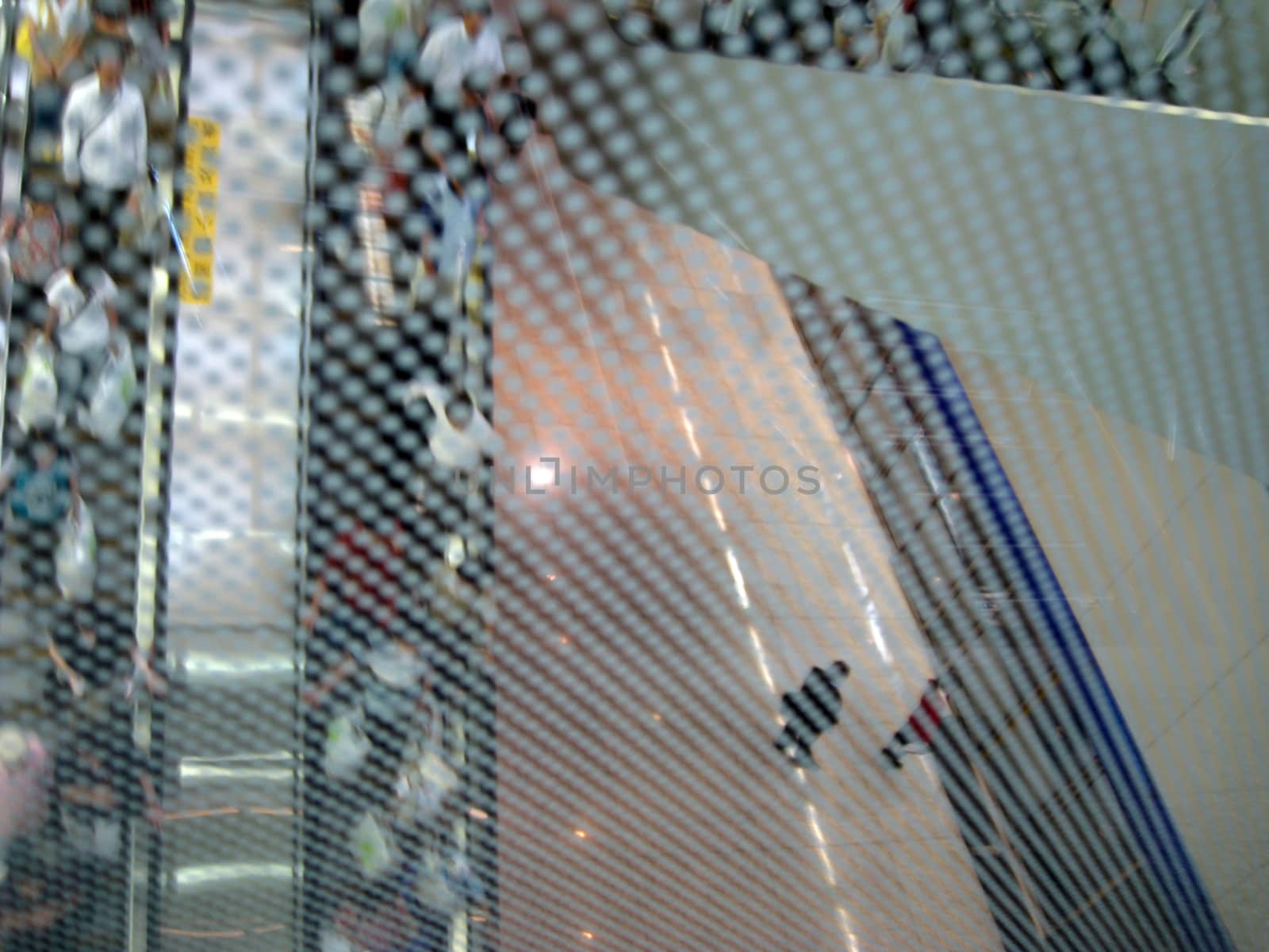 Airline passengers at the evelator, Hong Kong Airport