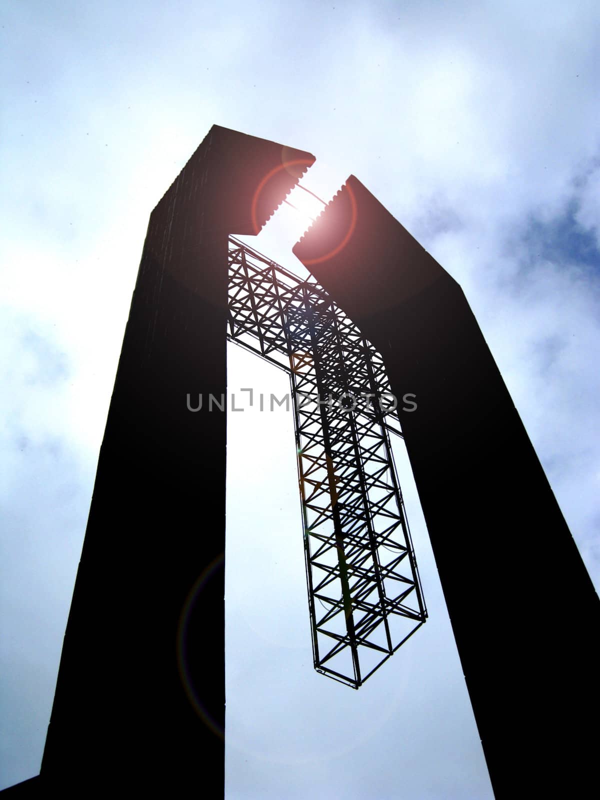 a big cross structure outside of a church