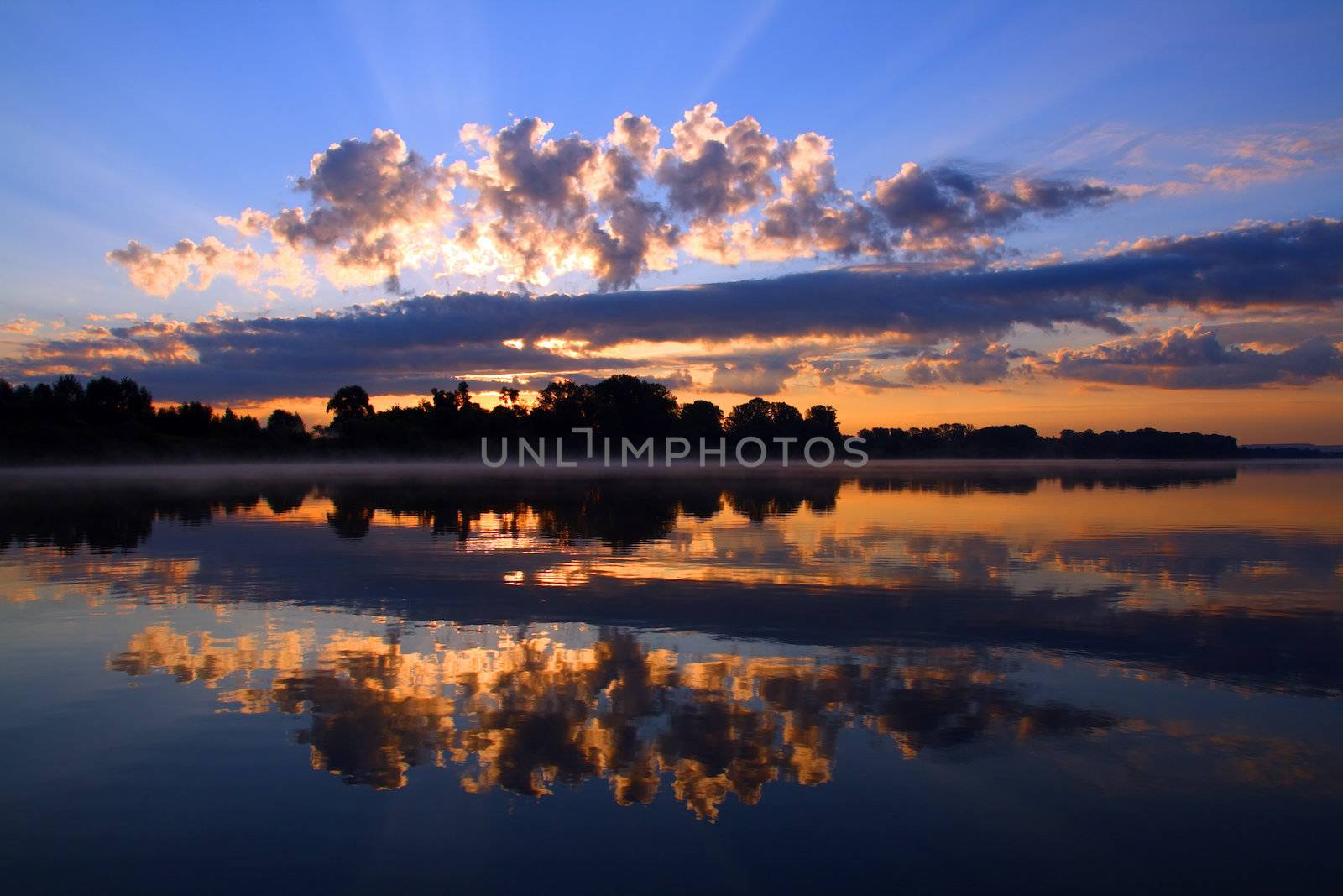 reflection sunrise with clouds on river