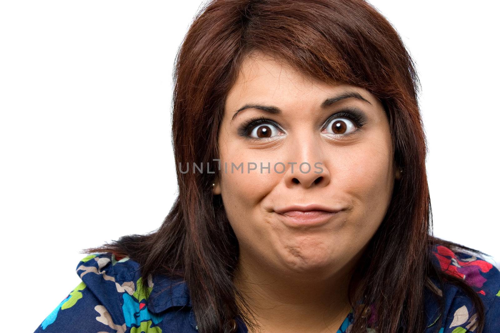 A woman isolated over white with a hilarious look on her face.