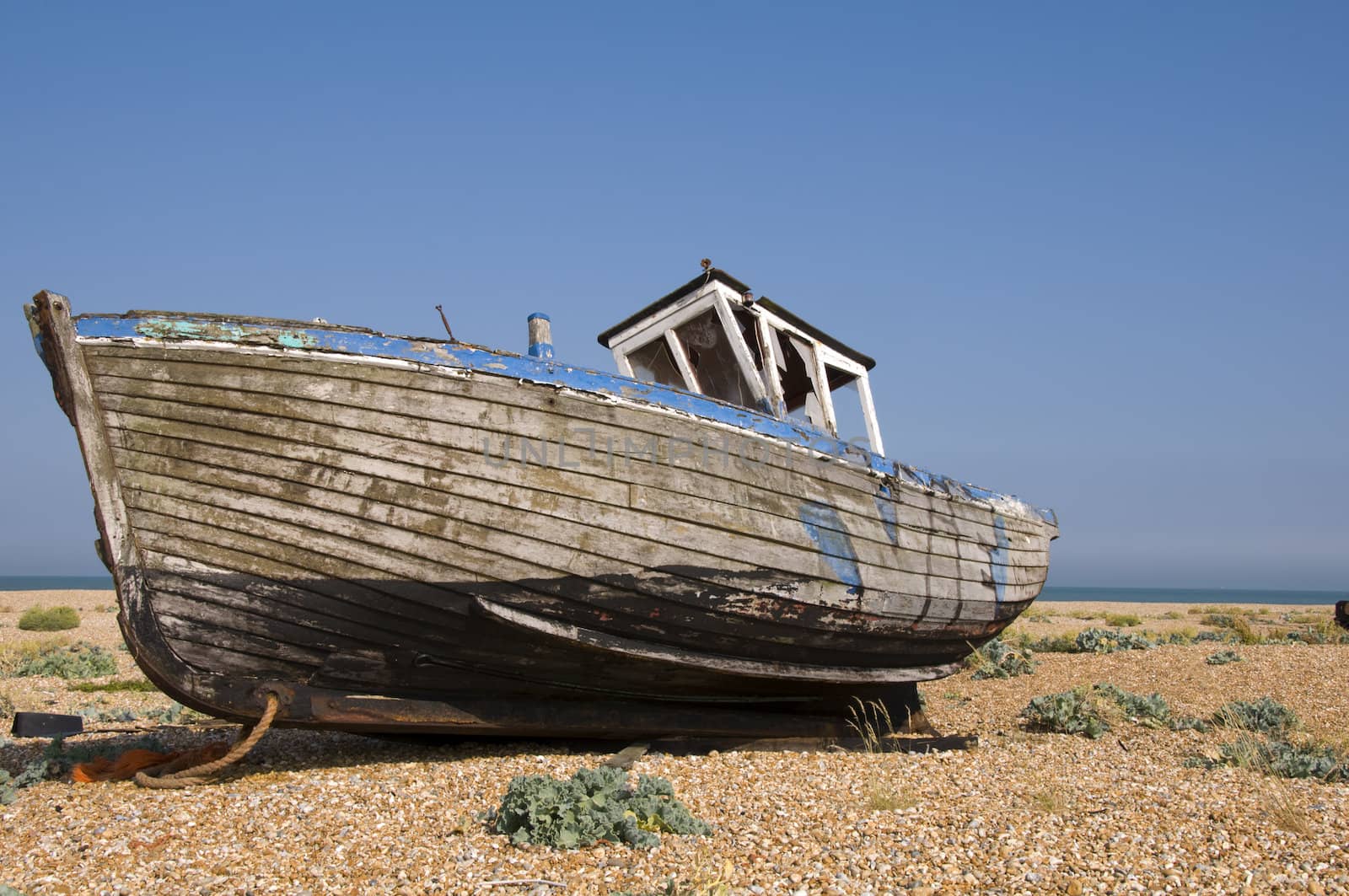 An old fishing boat on the beach at Dungeness