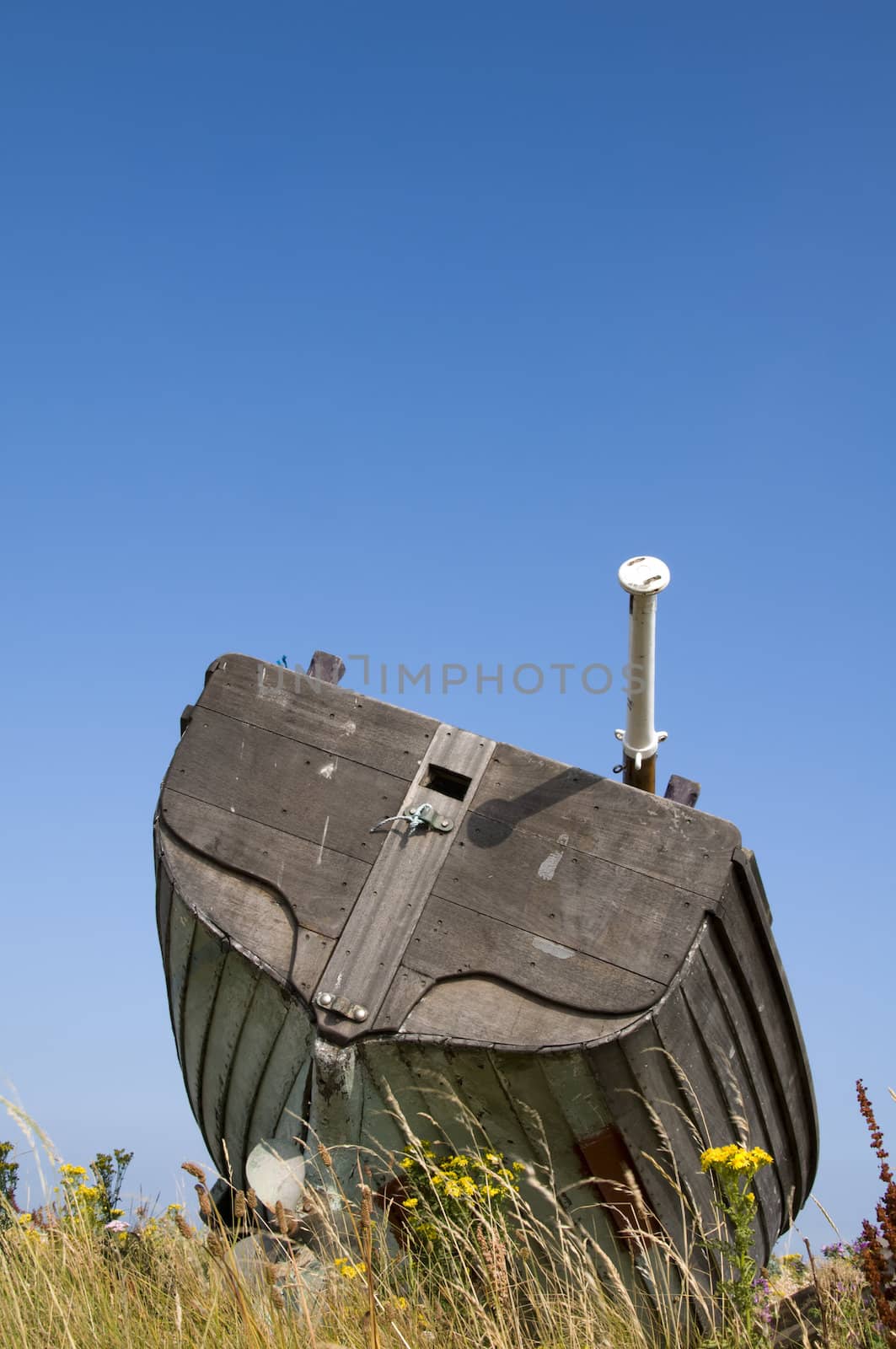 An old fishing boat on the beach at Dungeness