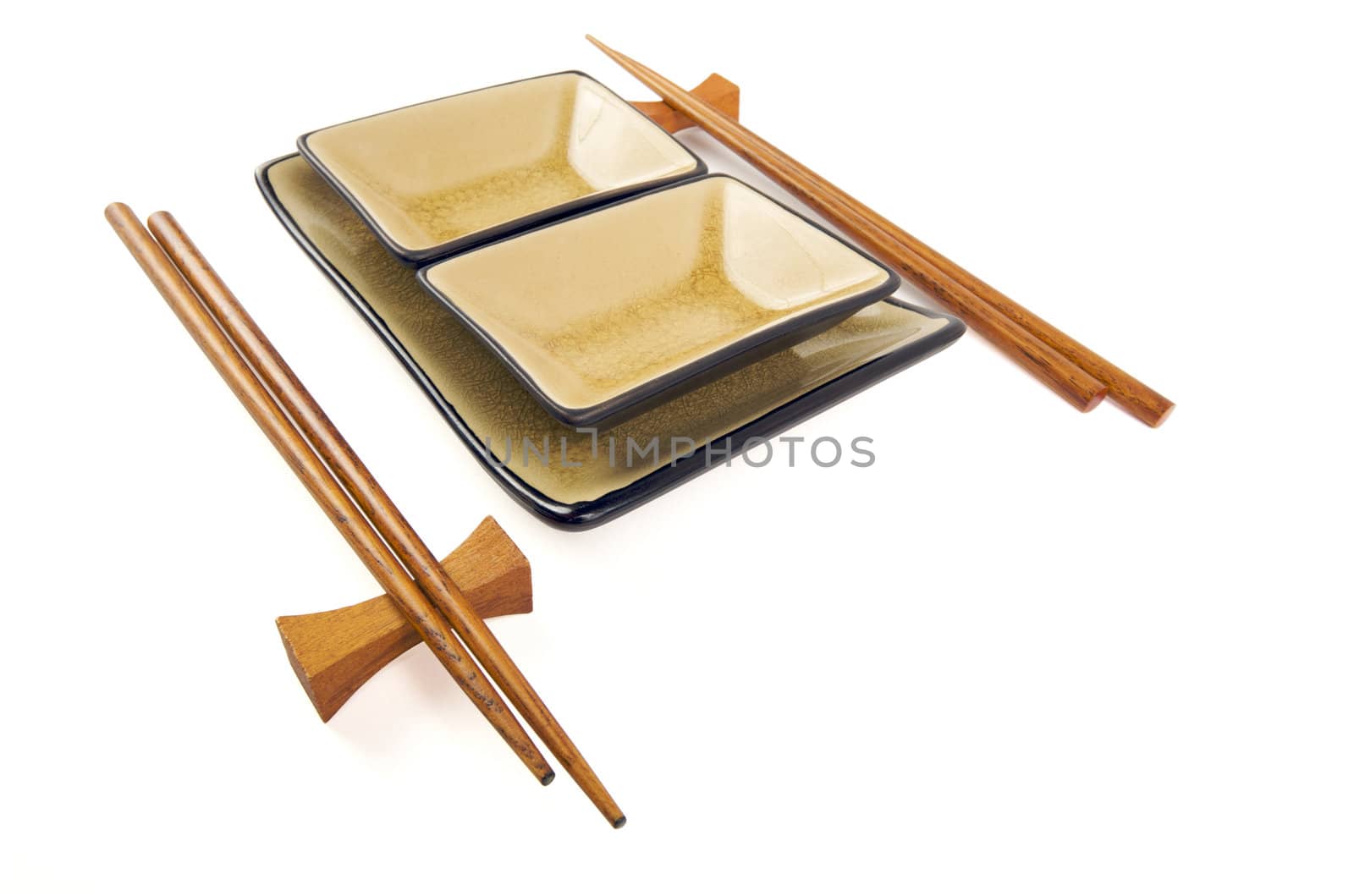 Abstract Chopsticks and Bowls Isolated on a White Background.
