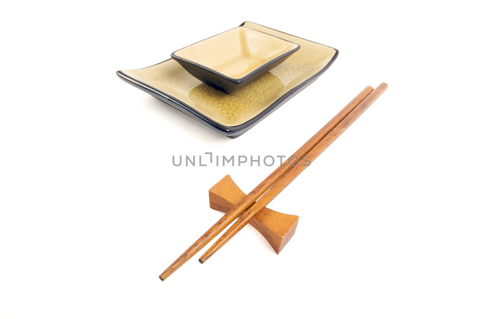 Abstract Chopsticks and Bowls Isolated on a White Background.
