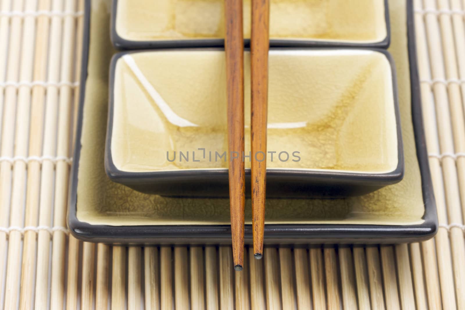 Abstract Chopsticks and Bowls with Narrow Depth of Field.
