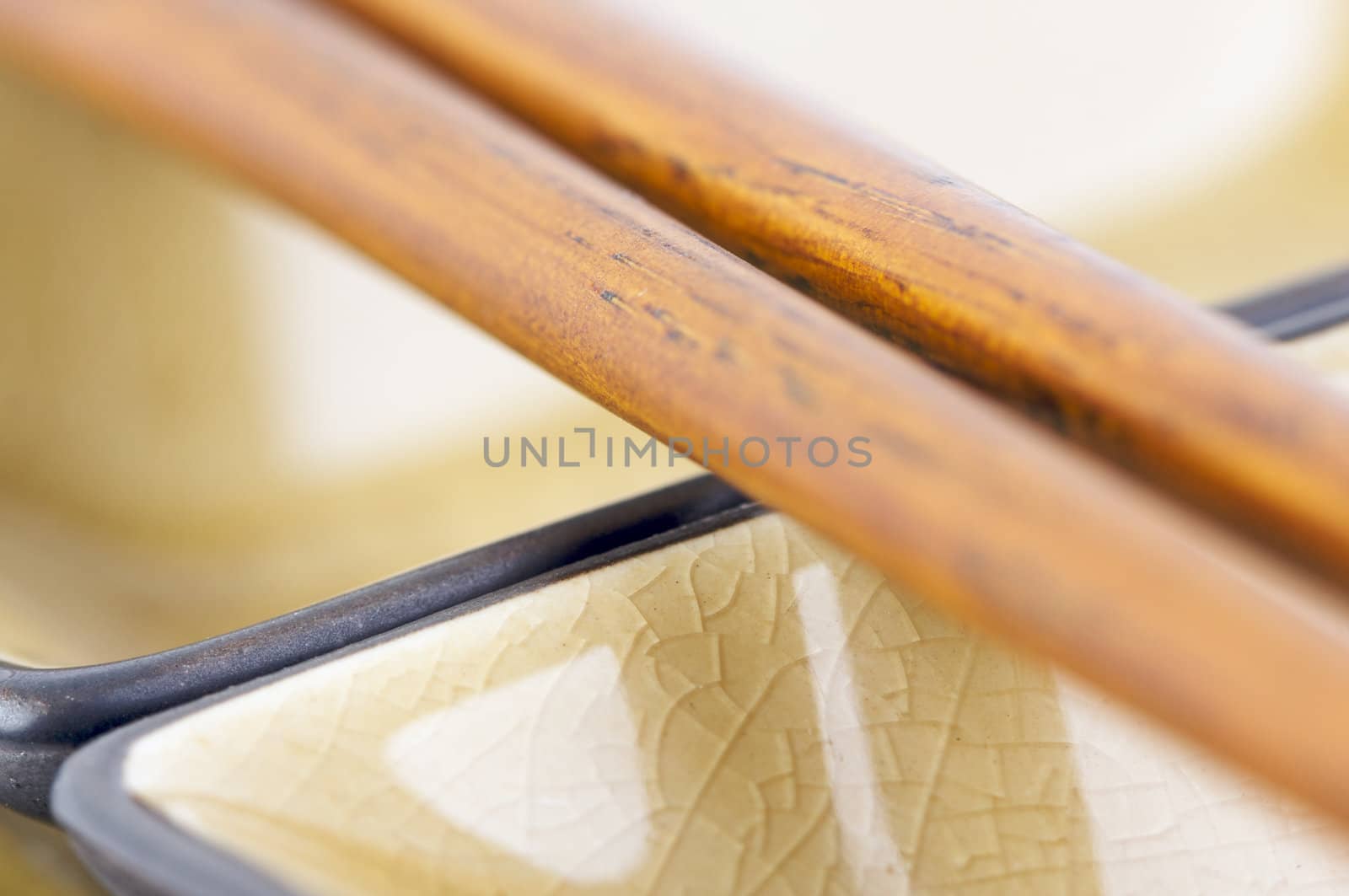 Abstract Chopsticks and Bowls with Narrow Depth of Field.
