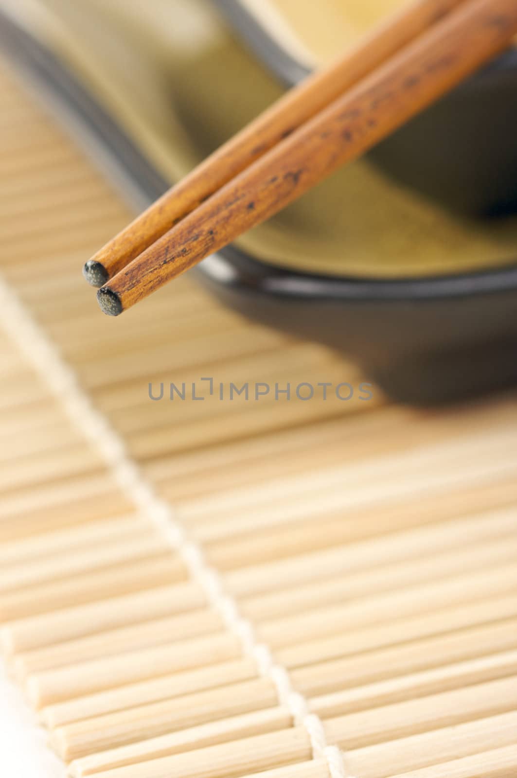 Abstract Chopsticks and Bowls with Narrow Depth of Field.
