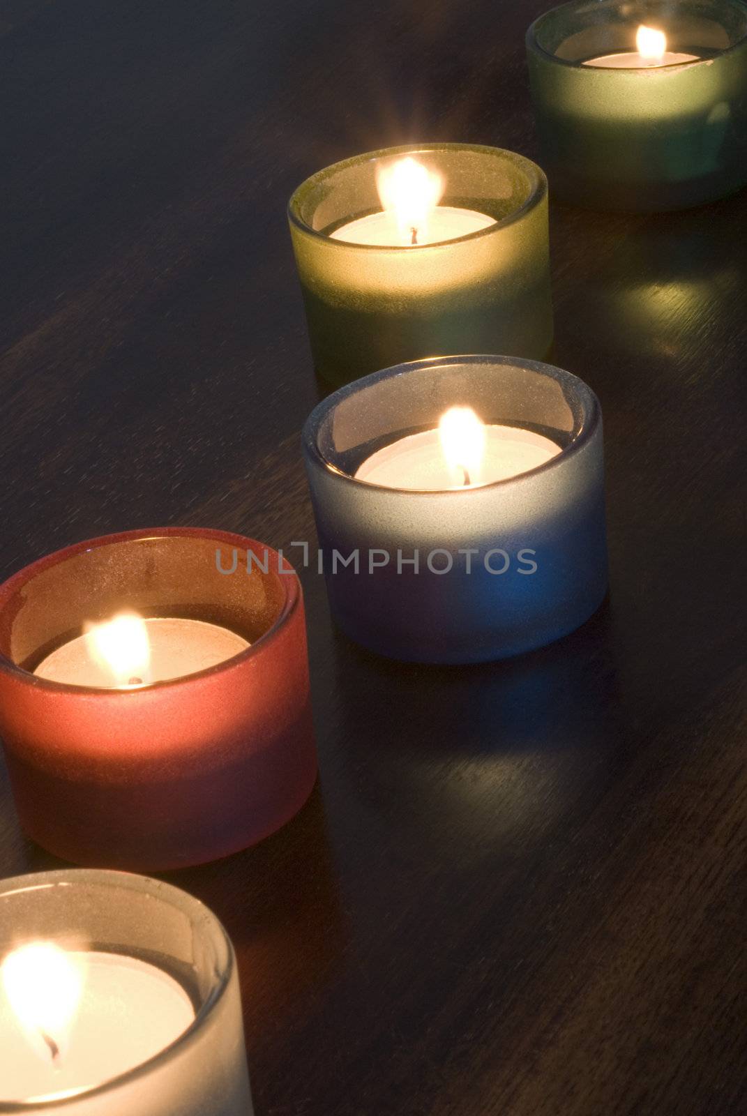 a set of 5 tea light candles